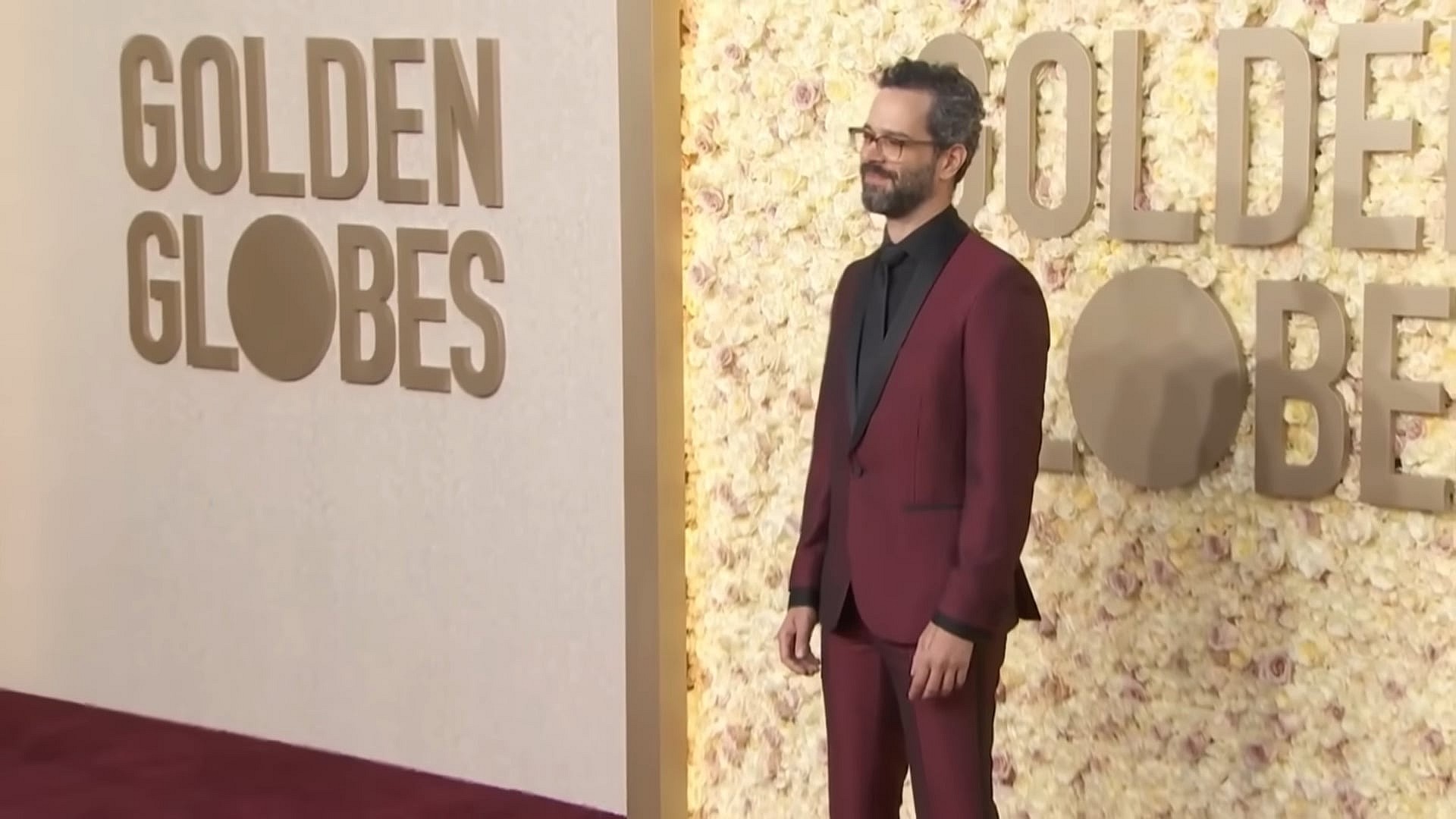 The Last of Us series co-creator Neil Druckmann tries to fit in with at the big kids' table at the 2023 Golden Globe Awards