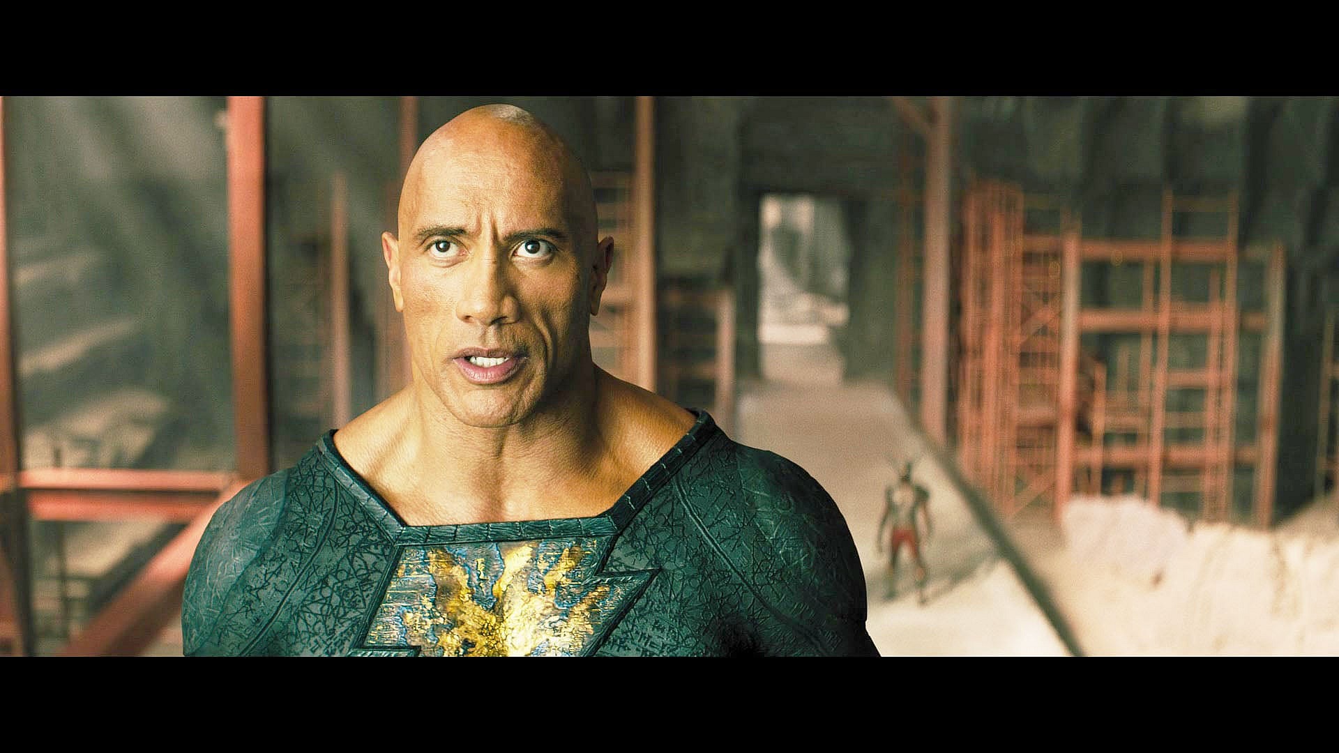 Black Adam (Dwayne Johnson) steels himself for a final showdown with Sabbac (Marwan Kenzari) in Black Adam (2022), Warner Bros. Pictures