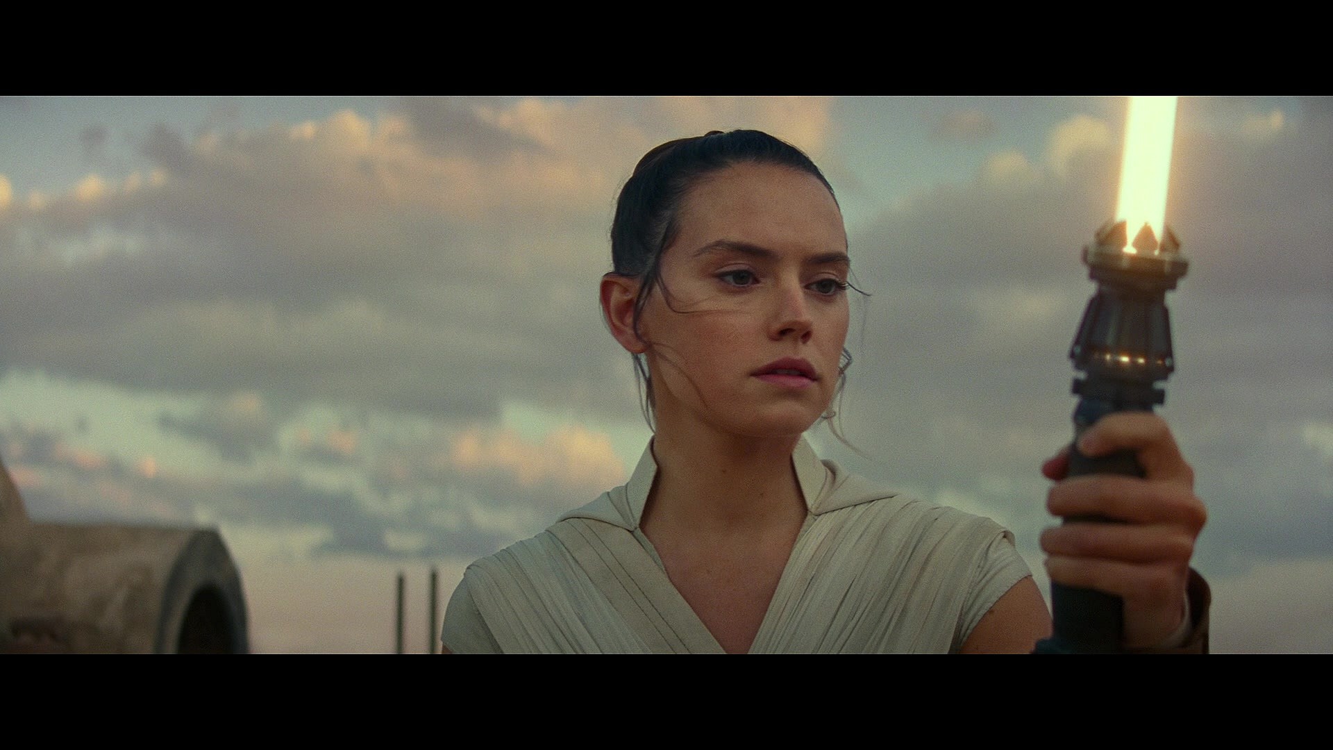 Rey (Daisy Ridley) ignites her lightsaber in Star Wars: Episode IX - The Rise of Skywalker (2019), Disney