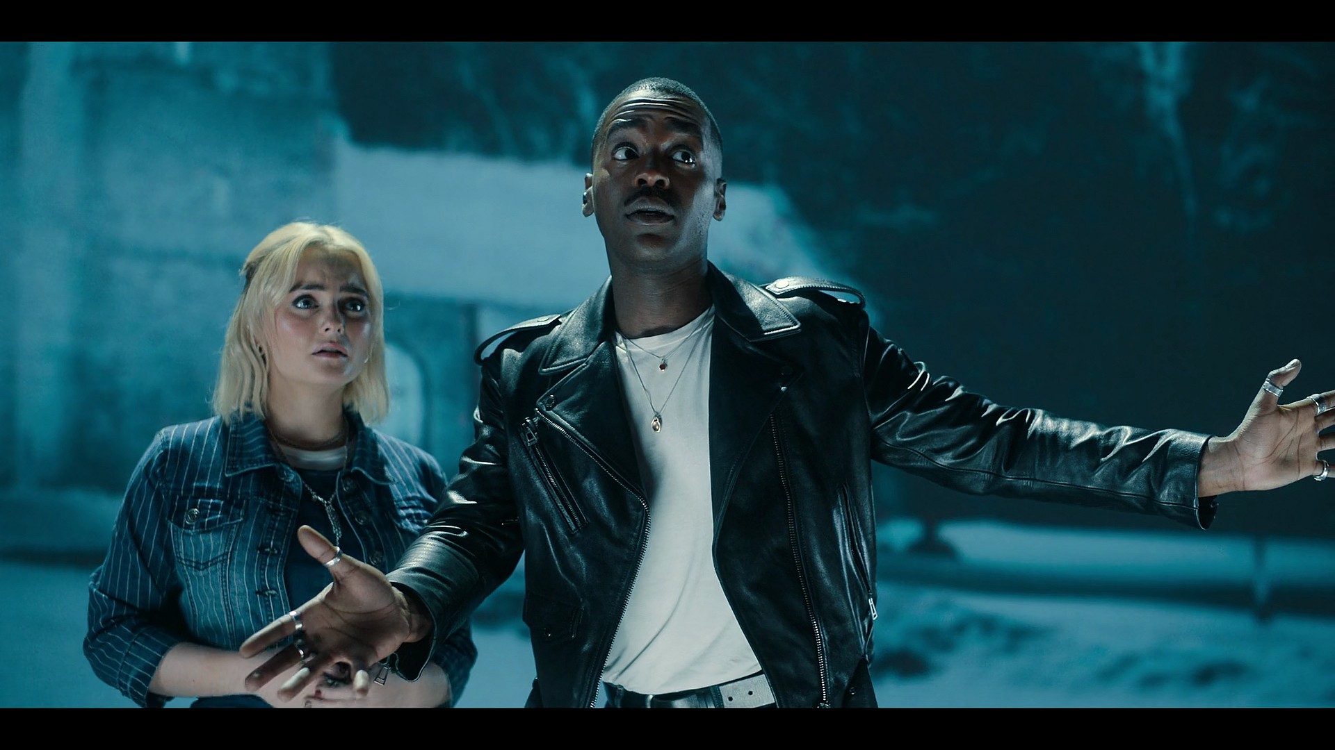 The Doctor (Ncuti Gatwa) and Ruby (Millie Gibson) attempt to make contact with a cloaked figure from the past in Doctor Who Series 14 Episode 7 "The Legend of Ruby Sunday" (2024), BBC