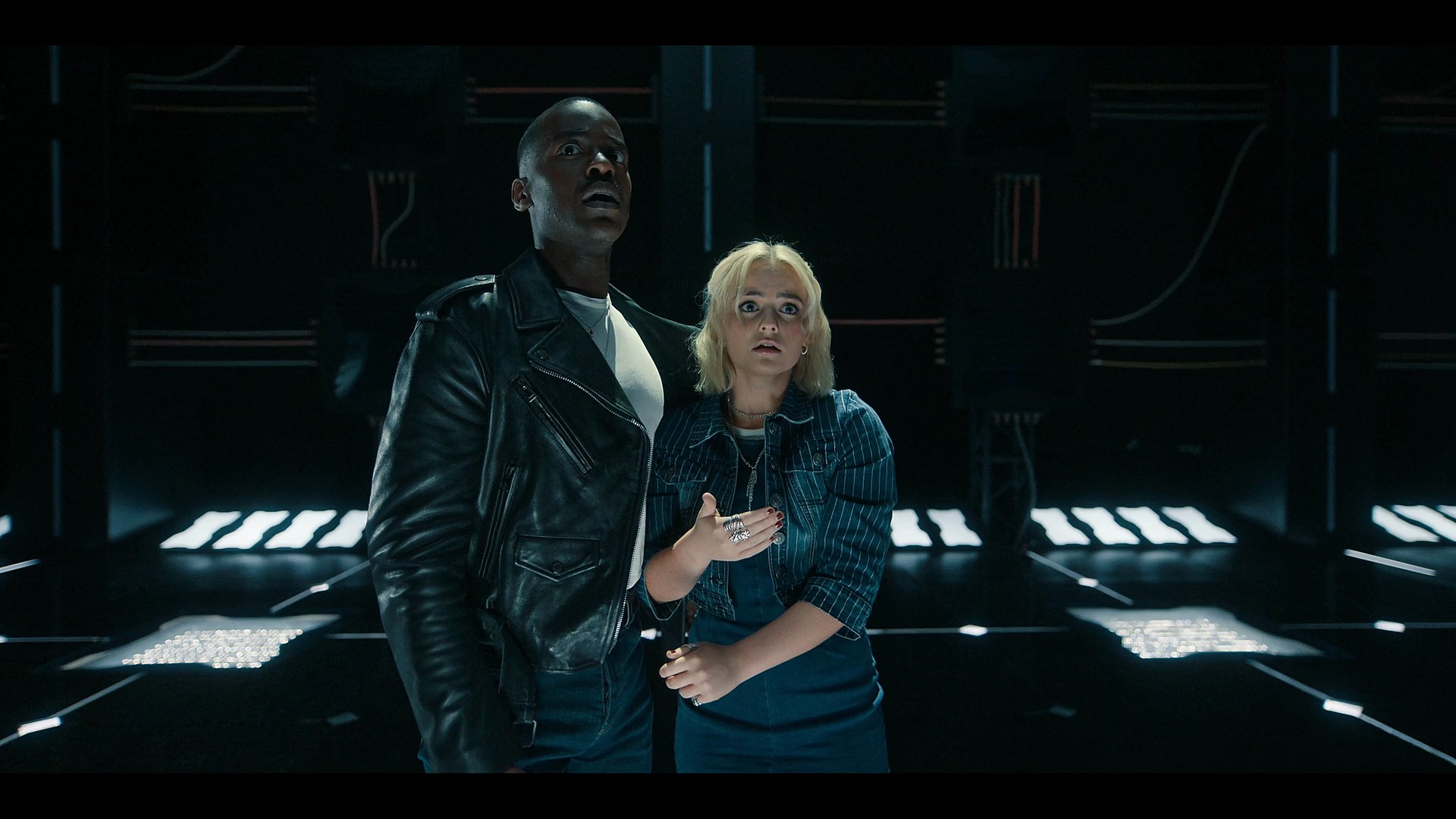 The Doctor (Ncuti Gatwa) and Ruby (Millie Gibson) emerge from a time window in Doctor Who Series 14 Episode 7 "The Legend of Ruby Sunday" (2024), BBC