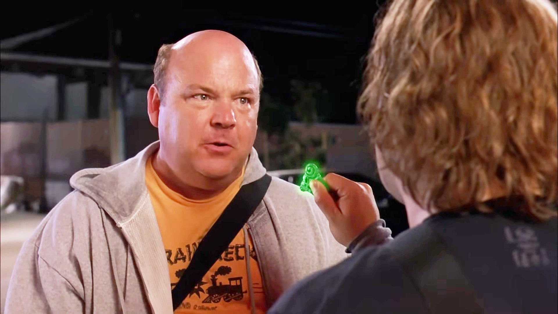 Kyle Gass is tempted by the titular guitar pick in Tenacious D in The Pick of Destiny (2006), New Line Cinema