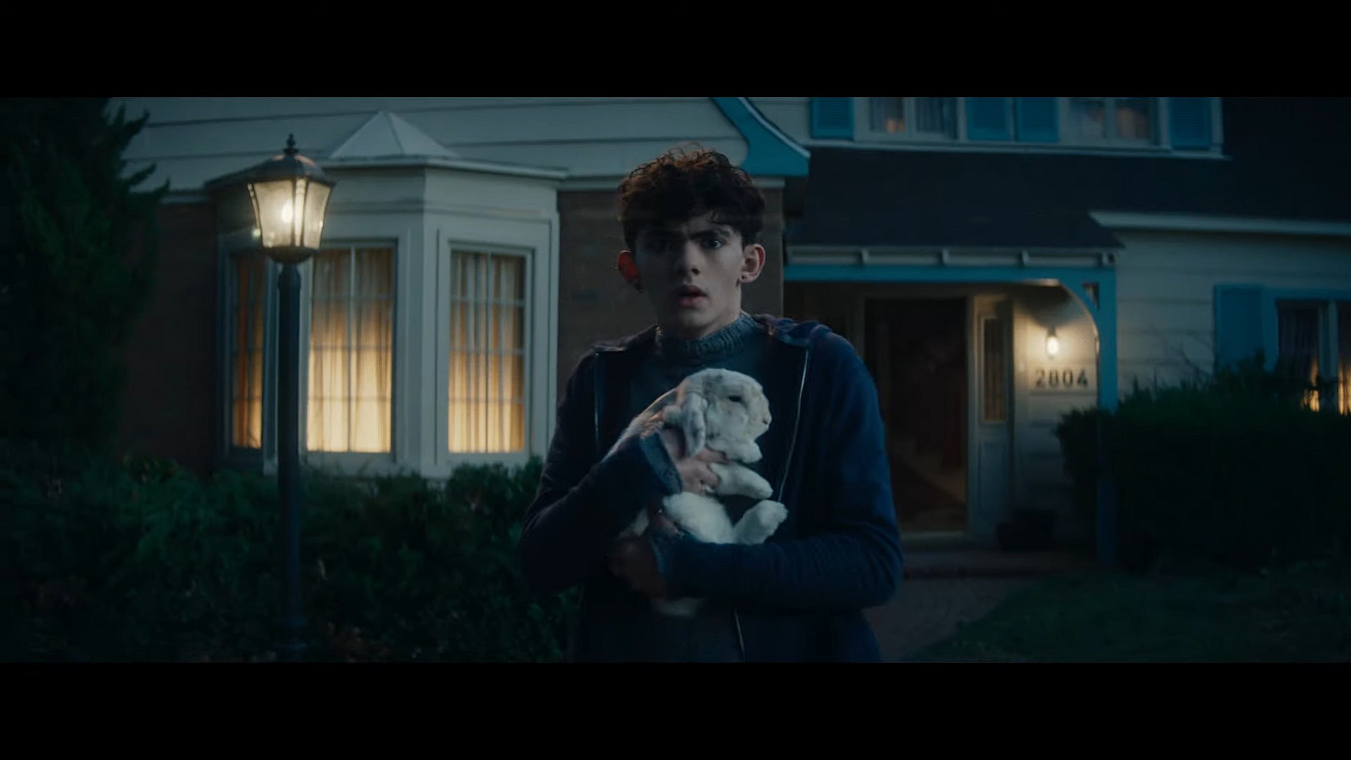 Billy Kaplan (Joe Locke) and Señor Scratchy are startled by the surprise appearance of a coven of witches in Agatha: All Along (2024), Marvel Entertainment