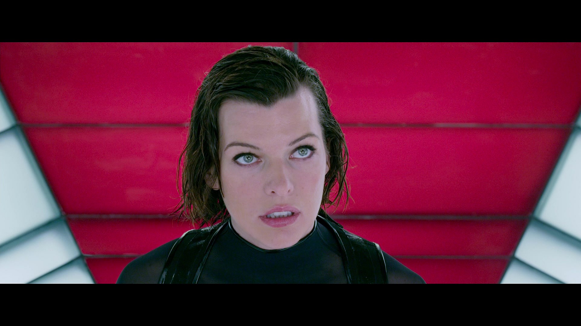 Alice (Milla Jovovich) accesses Umbrella's database in Resident Evil: Retribution (2010), Sony Pictures