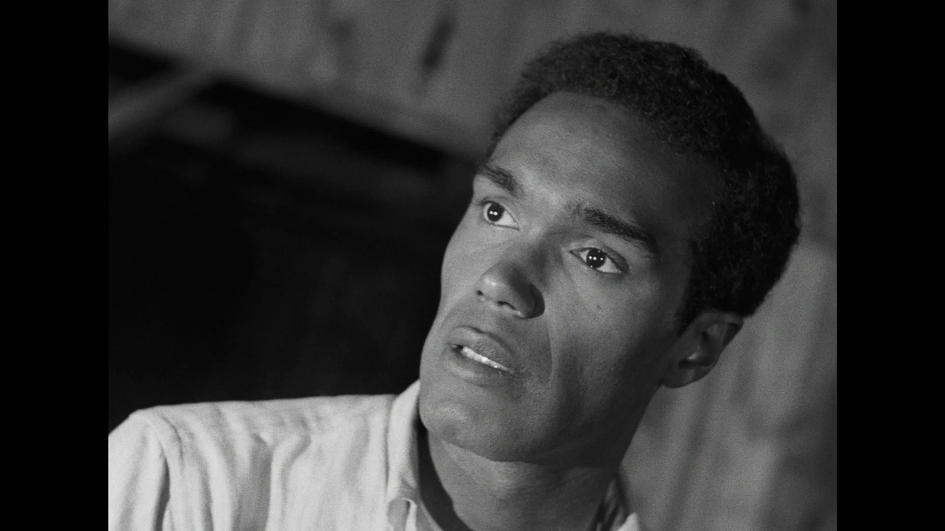 Ben (Duane Jones), watches in horror as Tom (Keith Wayne) and Judy (Judith Ridley) are set ablaze in Night of the Living Dead (1968), Continental Distributing