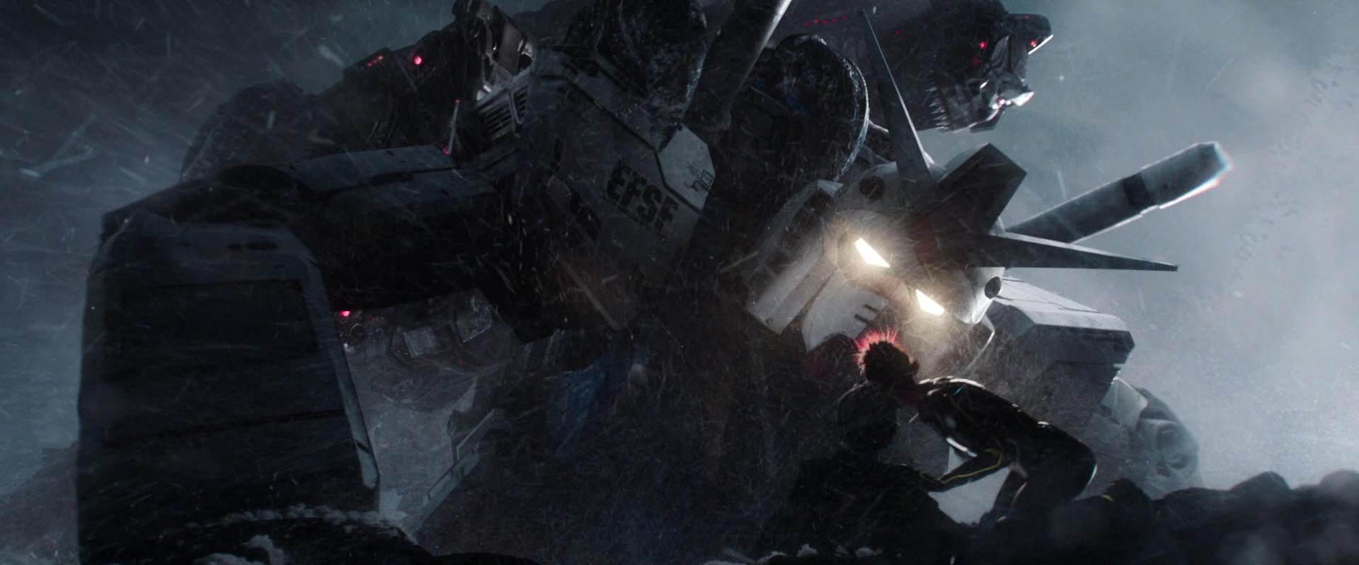 Daito (Win Morisaki) saves Parzival (Tye Sheridan) and Art3mis (Olivia Cooke) from Mechagodzilla with the RX-78-2 Gundam in Ready Player One (2018), Warner Bros. Pictures