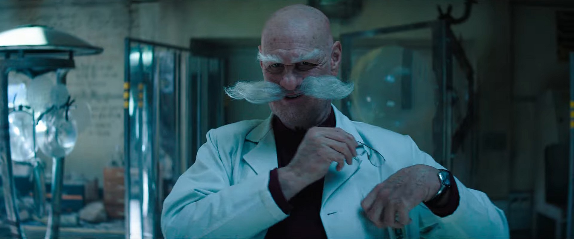 Gerald Robotnik (Jim Carrey) removes his glasses in Sonic the Hedgehog 3 (2024), Paramount Pictures