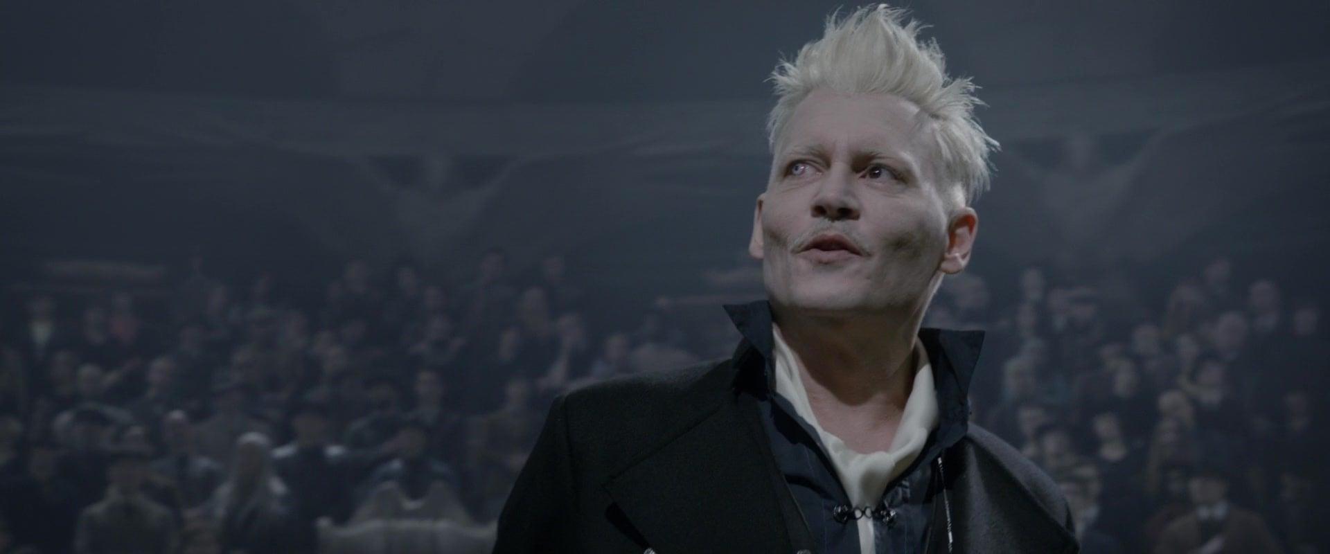 Gellert Grindelwald (Johnny Depp) rallies his followers in Fantastic Beasts: The Crimes of Grindelwald (2018), Warner Bros. Pictures via Blu-ray