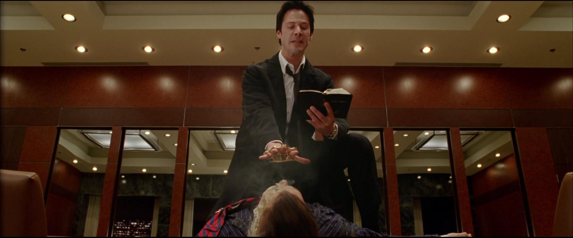 John Constantine (Keanu Reeves) prepares to put an end to Balthazar (Gavin Rossdale) in Constantine (2005), Warner Bros. Pictures
