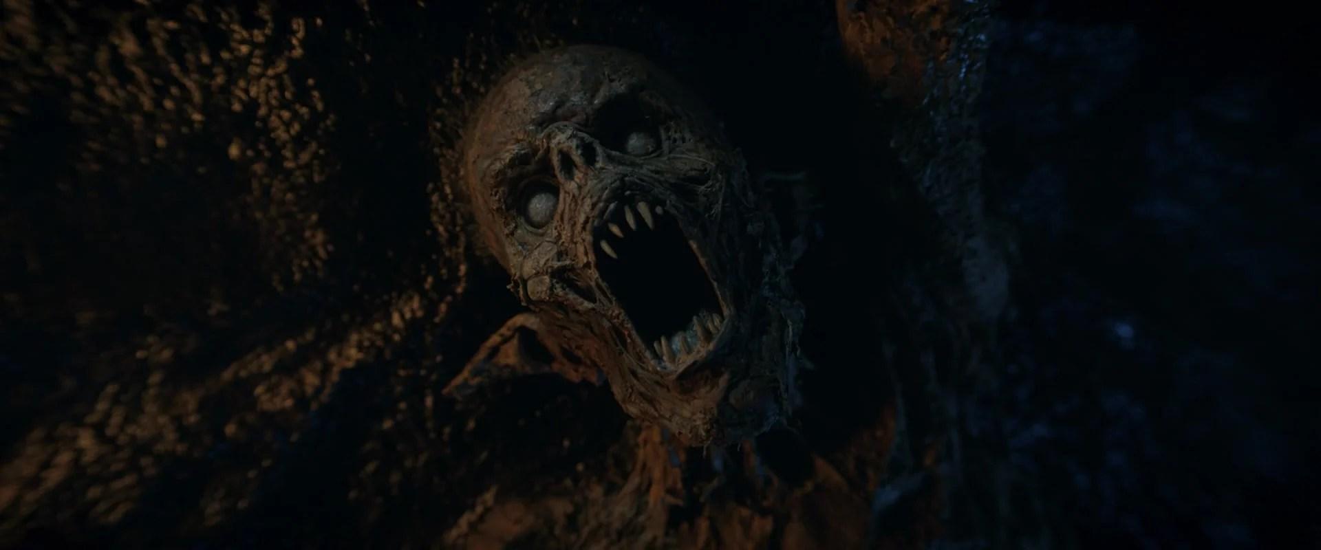 The decapitated head of an orc begins to decay in The Lord of the Rings: The Rings of Power Season 1 Episode 8 "Alloyed" (2022), Amazon Studios