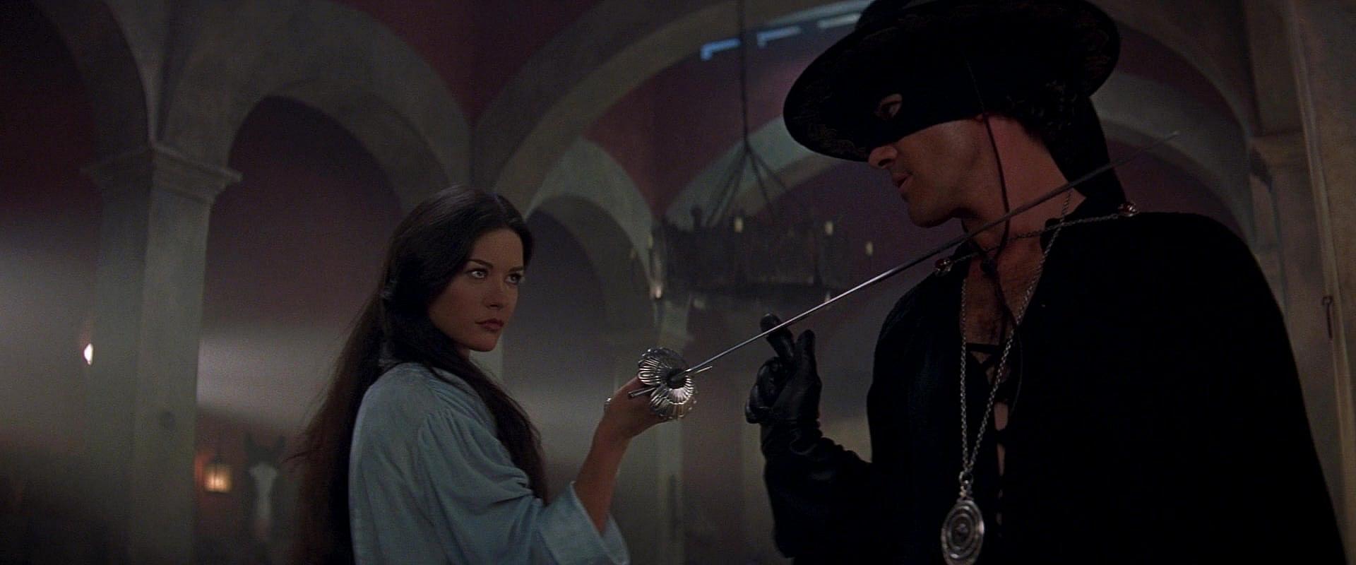 Elena Montero (Catherine Zeta-Jones) accosts Zorro (Antonio Banderas) in The Mask of Zorro (1998)