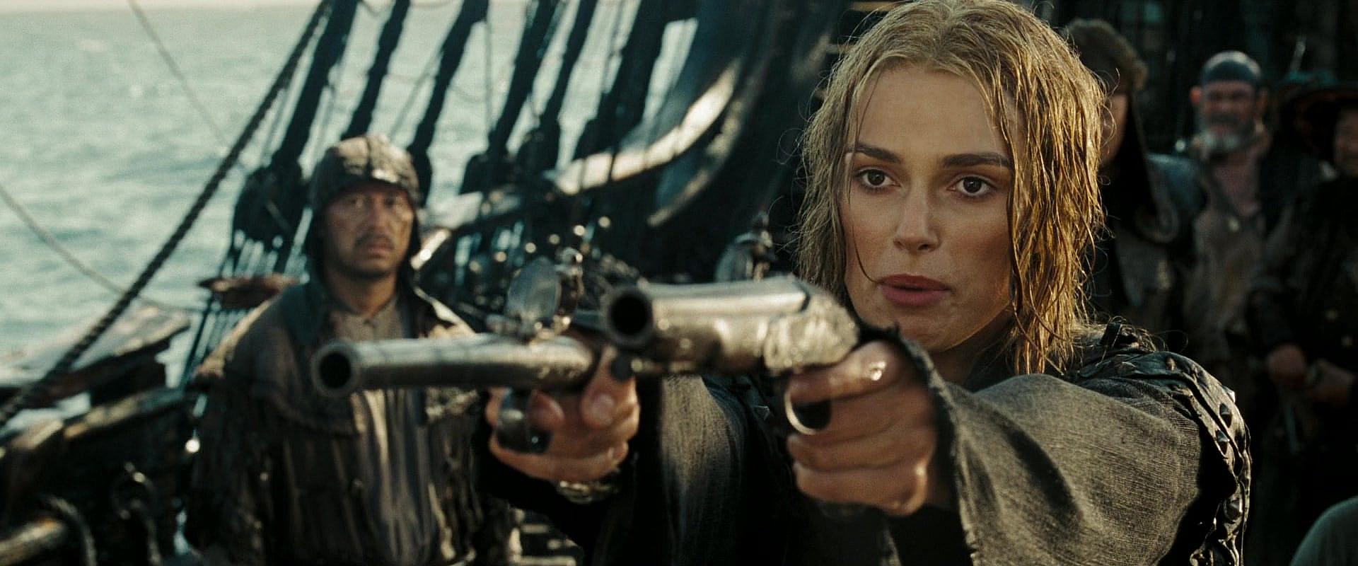 Elizabeth Swann draws gun on Captain Jack Sparrow in Pirates of the Caribbean: Dead Man's Chest