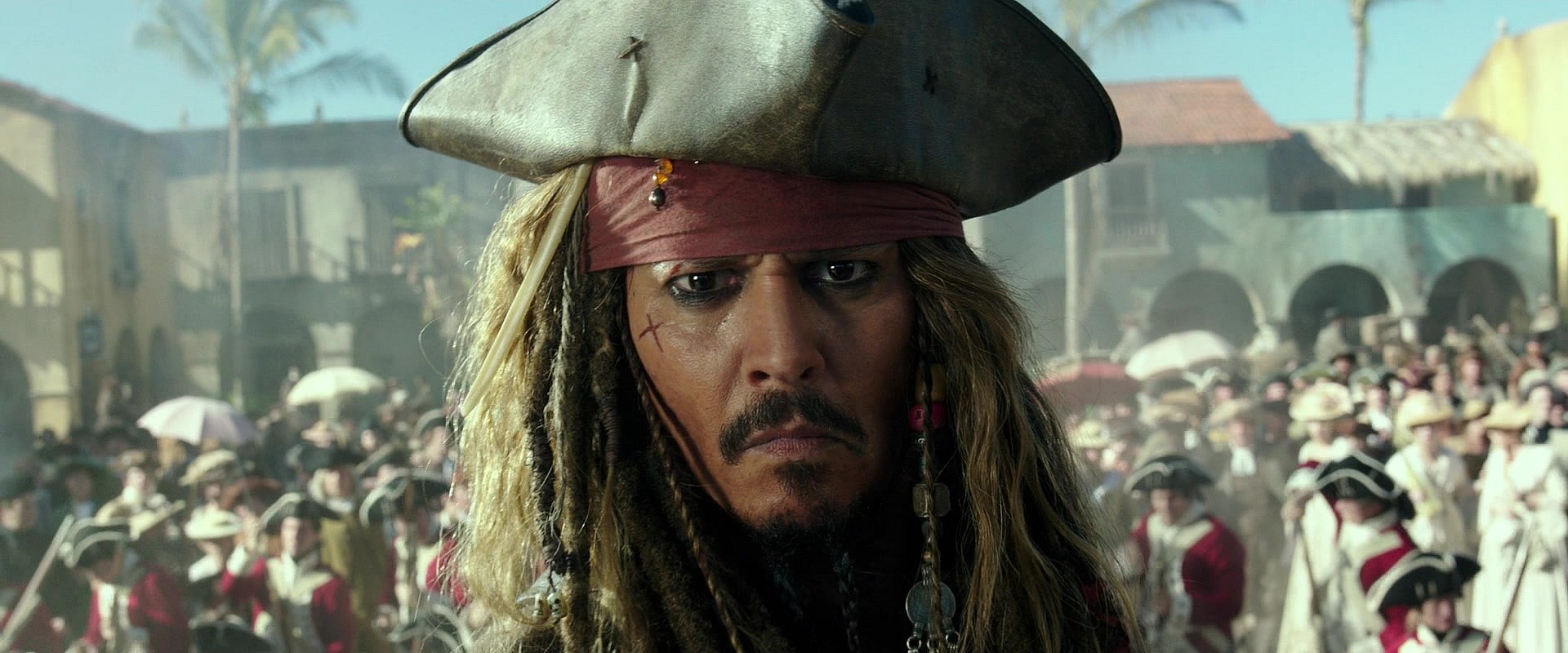 Captain Jack Sparrow (Johnny Depp) is unamused by his current predicament in Pirates of the Caribbean: Dead Men Tell No Tales (2011), Disney