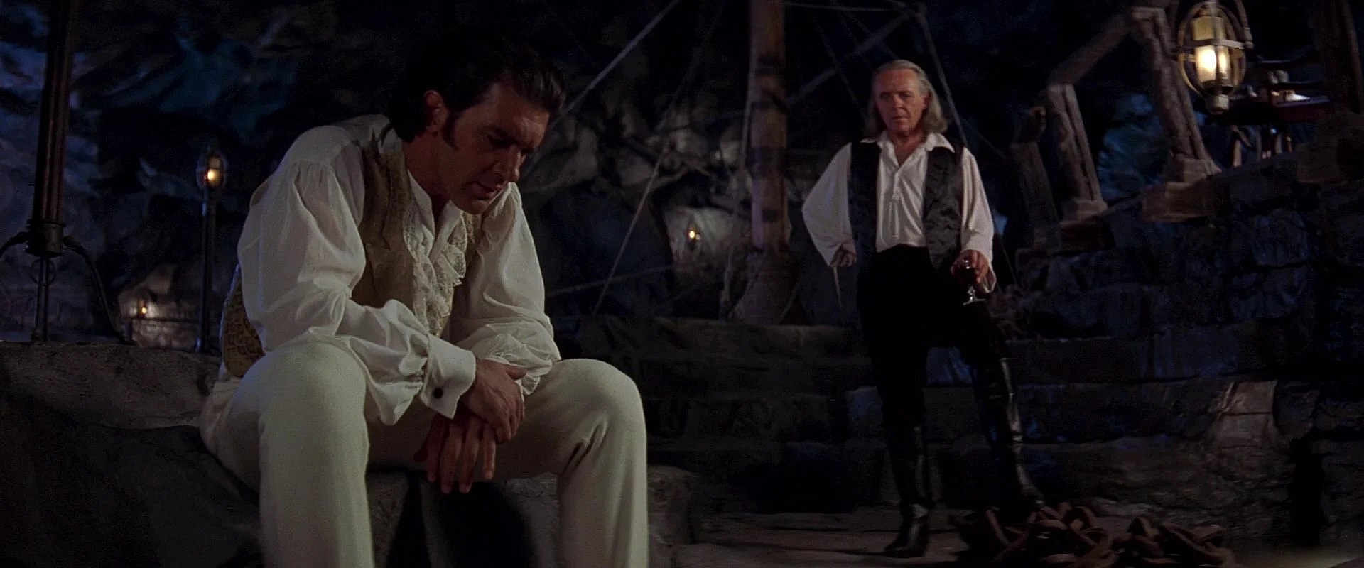 Don Diego de la Vega (Anthony Hopkins) chastises Alejandro Murrieta (Antonio Banderas) for soiling the name of Zorro in The Mask of Zorro (1998), Sony Pictures via Blu-ray