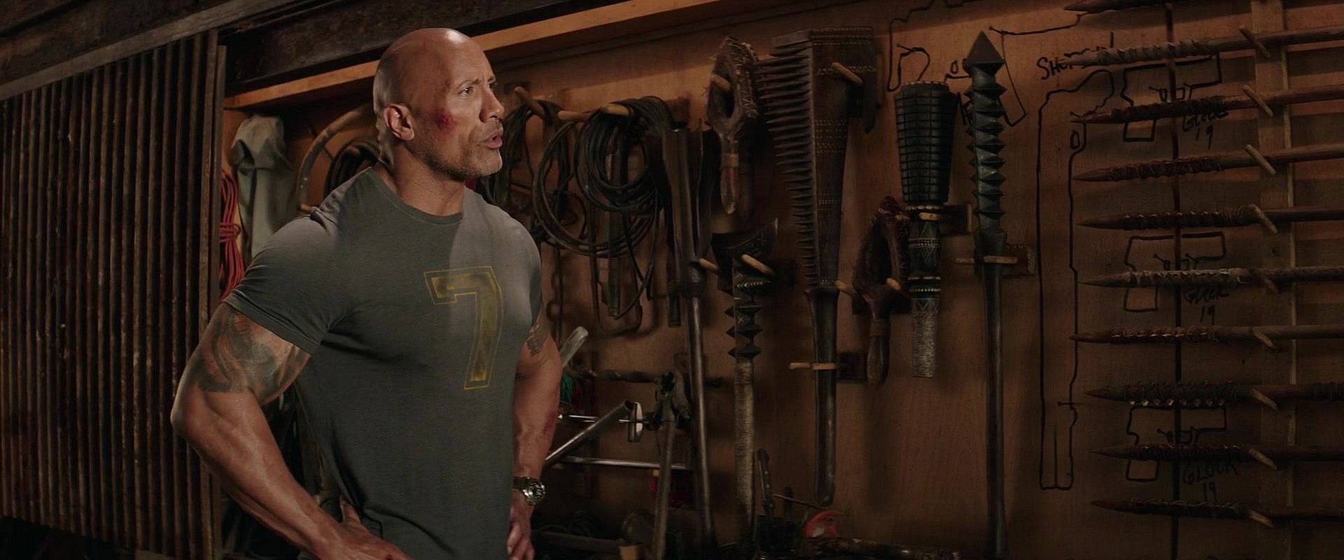 Lucas Hobbs (Dwayne 'The Rock' Johnson) arms up in Fast & Furious Presents: Hobbs & Shaw (2019), Universal Pictures