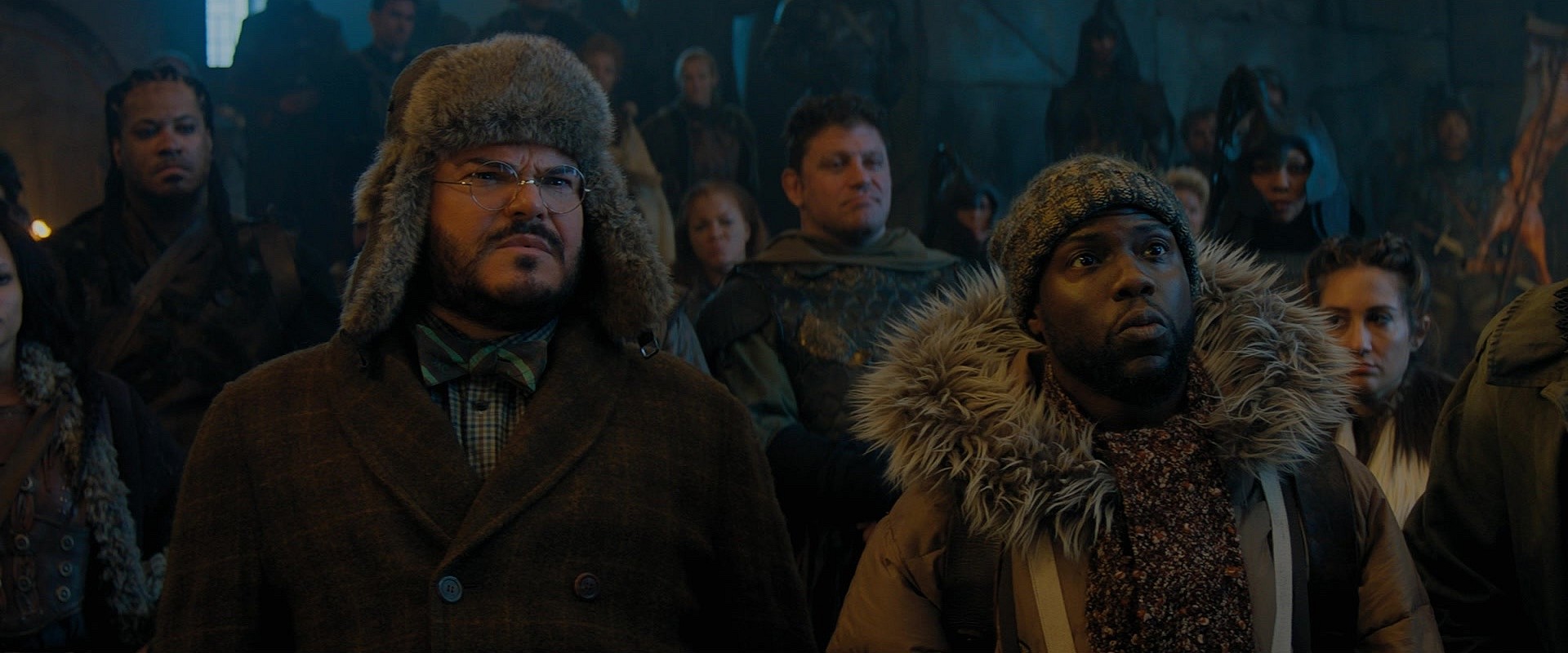 Bethany (Jack Black) and Fridge (Kevin Hart) attempt to fool Jurgen the Brutal (Rory McCann) in Jumanji: The Next Level (2019), Columbia Pictures