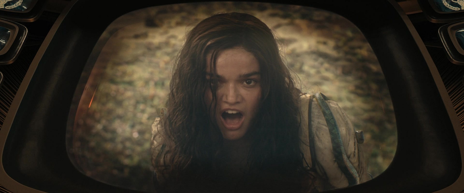 Lucy (Rachel Zegler) stands as the lone survivor of Gaul's (Viola Davis) flooding of the arena with snakes in The Hunger Games: The Ballad of Songbirds and Snakes (2023), Lionsgate Films