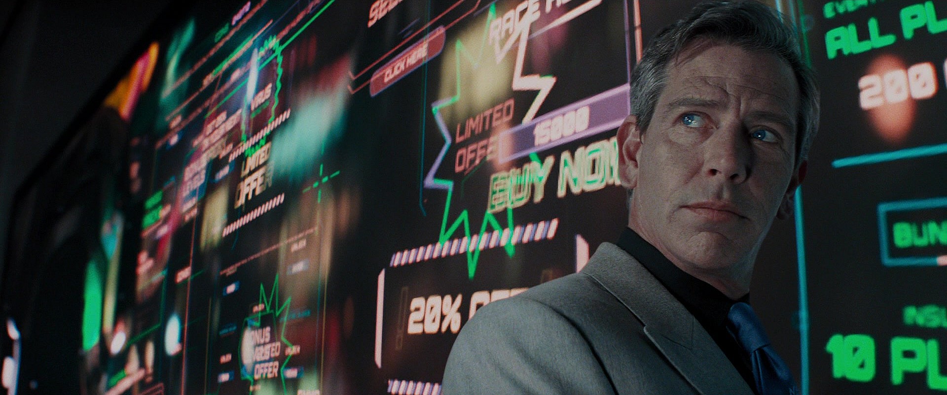Nolan Sorrento (Ben Mendelsohn) explains his advert-laden plans for OASIS' future in Ready Player One (2018), Warner Bros. Pictures