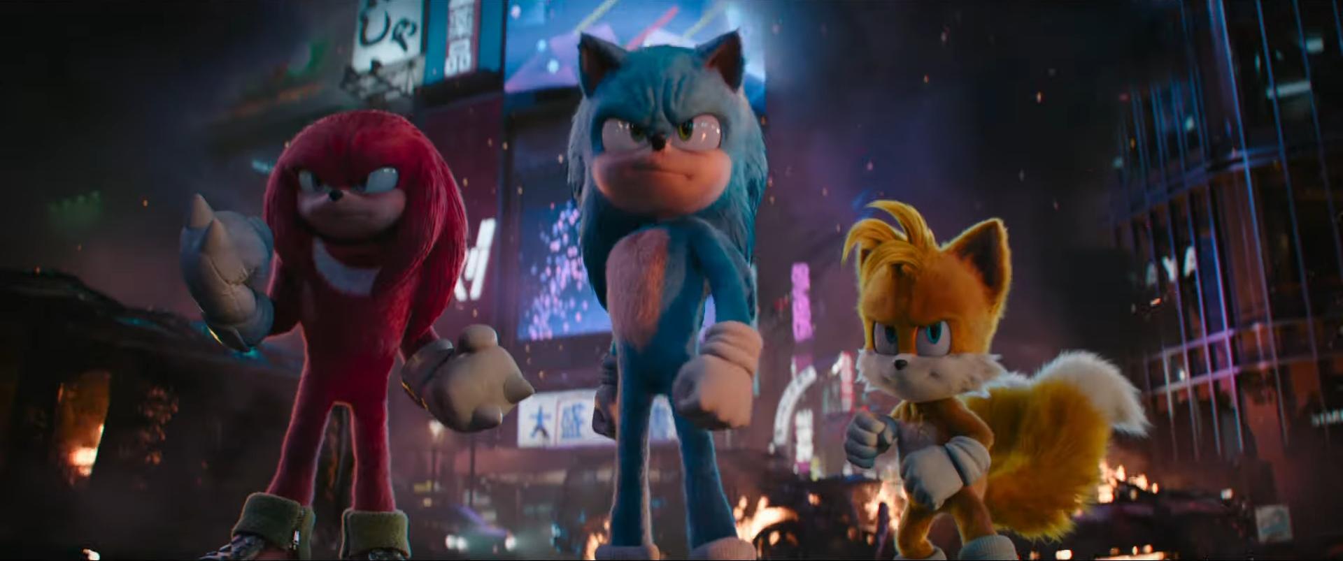Sonic (Ben Schwartz), Tails (Colleen O'Shaughnessey), and Knuckles (Idris Elba) stand ready to fight in Sonic the Hedgehog 3 (2024), Paramount Pictures