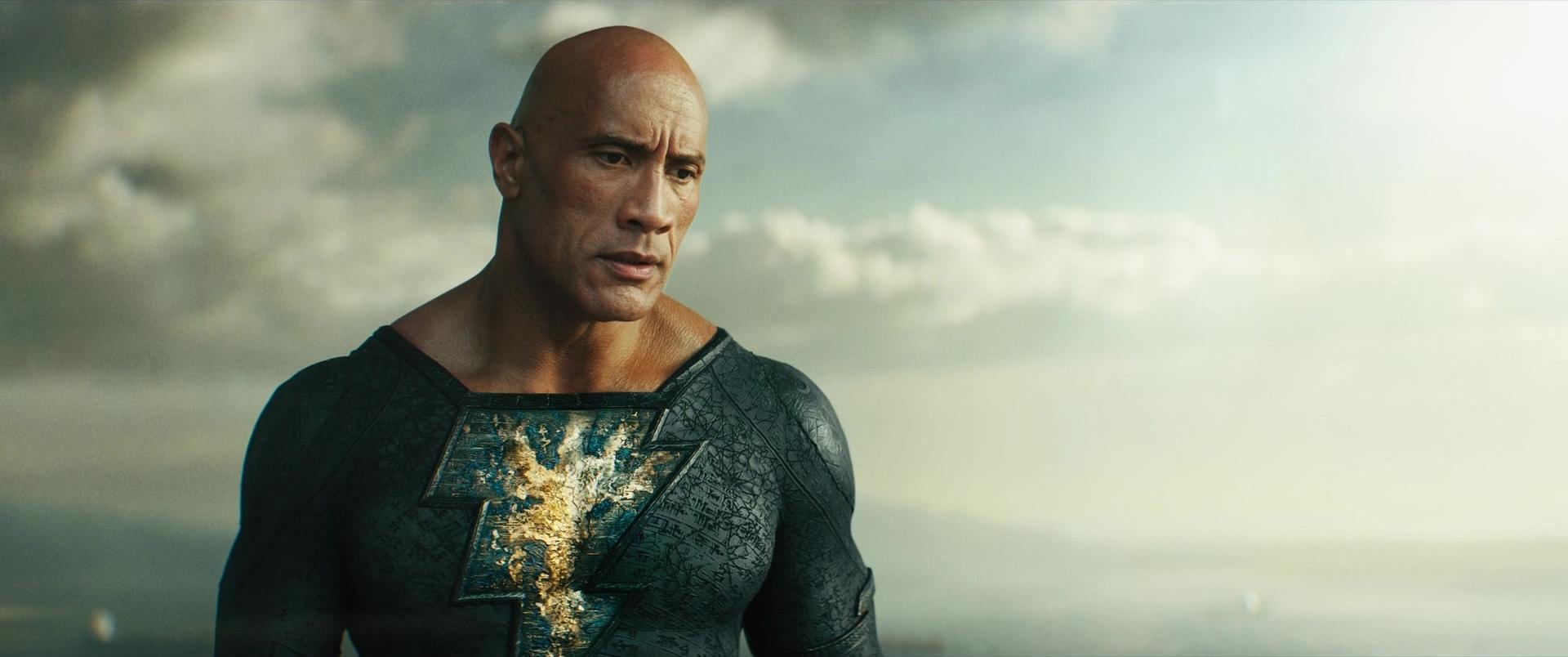 Teth Adam (Dwayn Johnson) contemplates the statue of Kahndaq's champion in Black Adam (2022), Warner Bros. Pictures