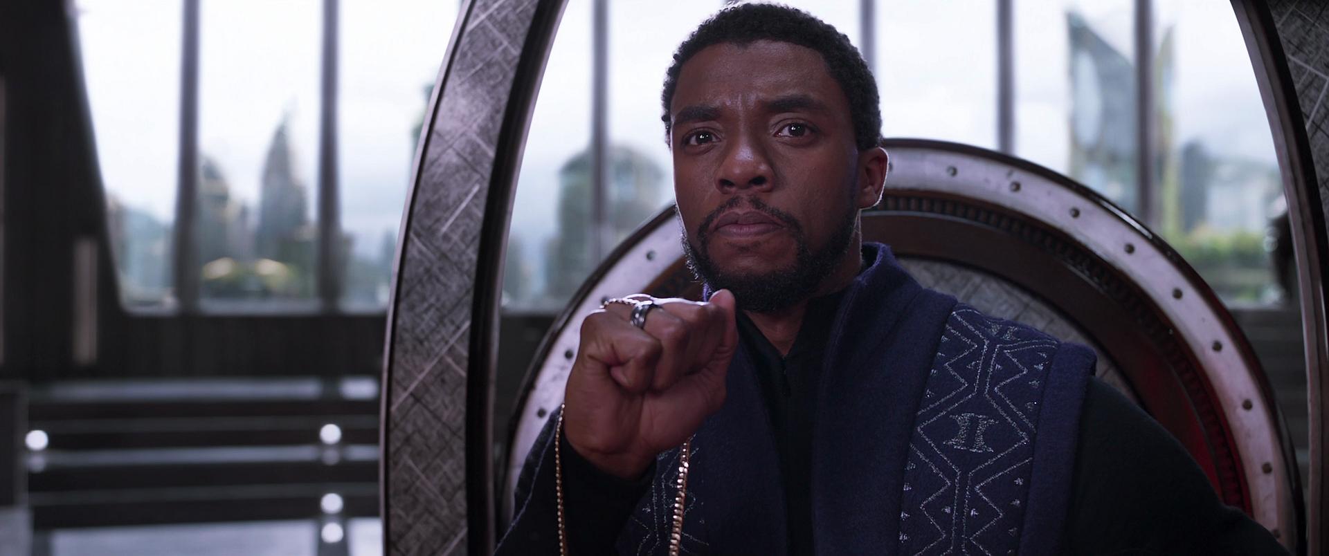T'Challa (Chadwick Boseman) sits upon the Wakandan throne in Black Panther (2019), Marvel