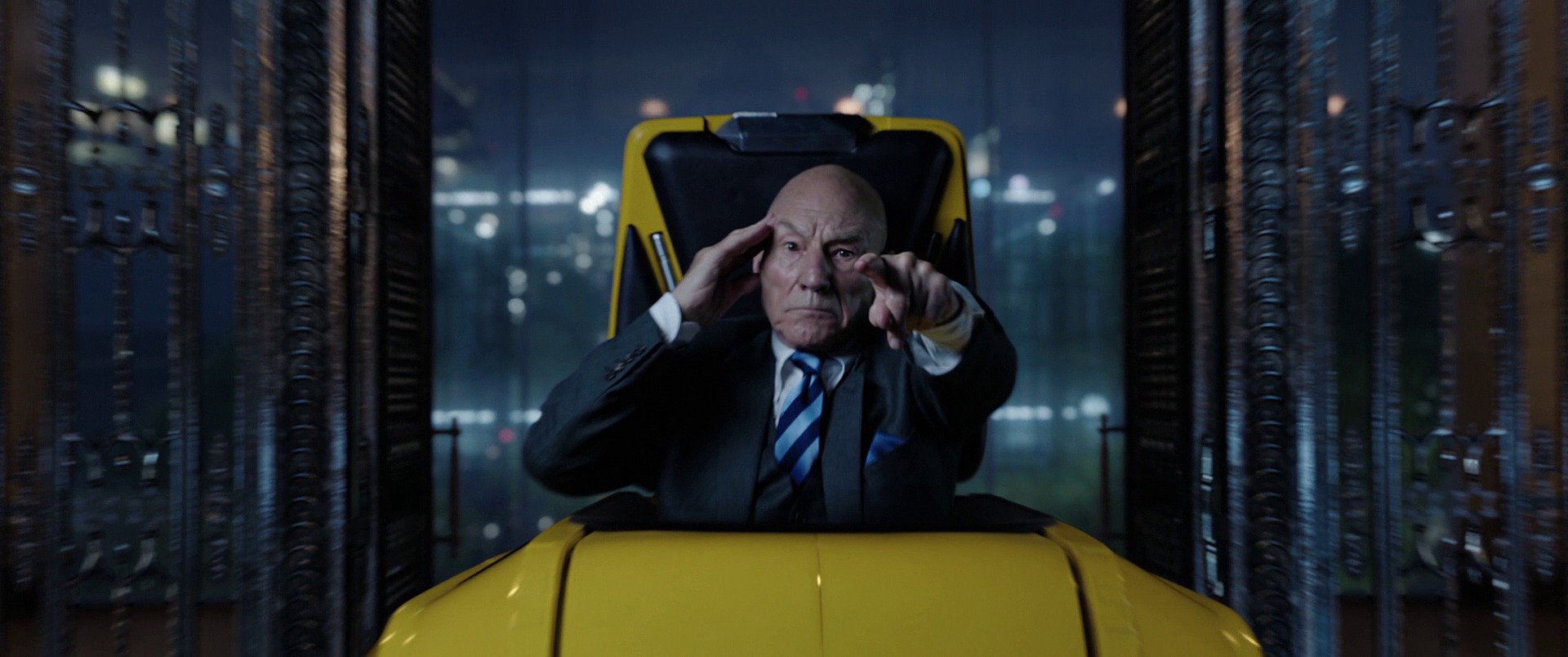 Charles Xavier (Patrick Stewart) unleashes his powers upon the Scarlet Witch (Elizabeth Olsen) in Doctor Strange in the Multiverse of Madness (2022), Marvel Entertainment