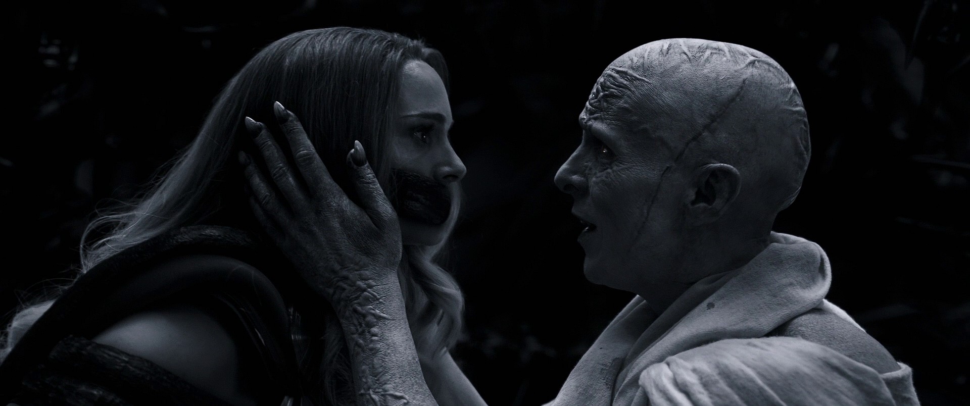 Gorr (Christian Bale) taunts Jane Foster (Natalie Portman) in Thor: Love and Thunder (2022), Marvel Entertainment