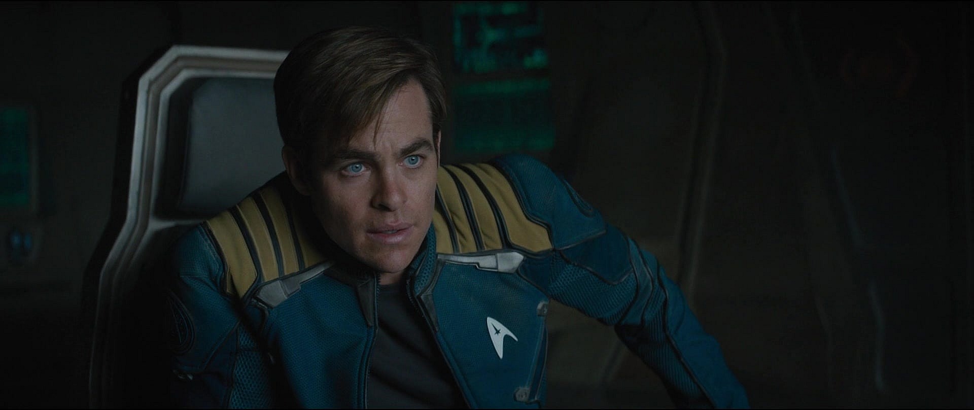 Captain Kirk (Chris Pine) takes a breather after crash landing the U.S.S. Enterprise in Star Trek Beyond (2016), Paramount Pictures