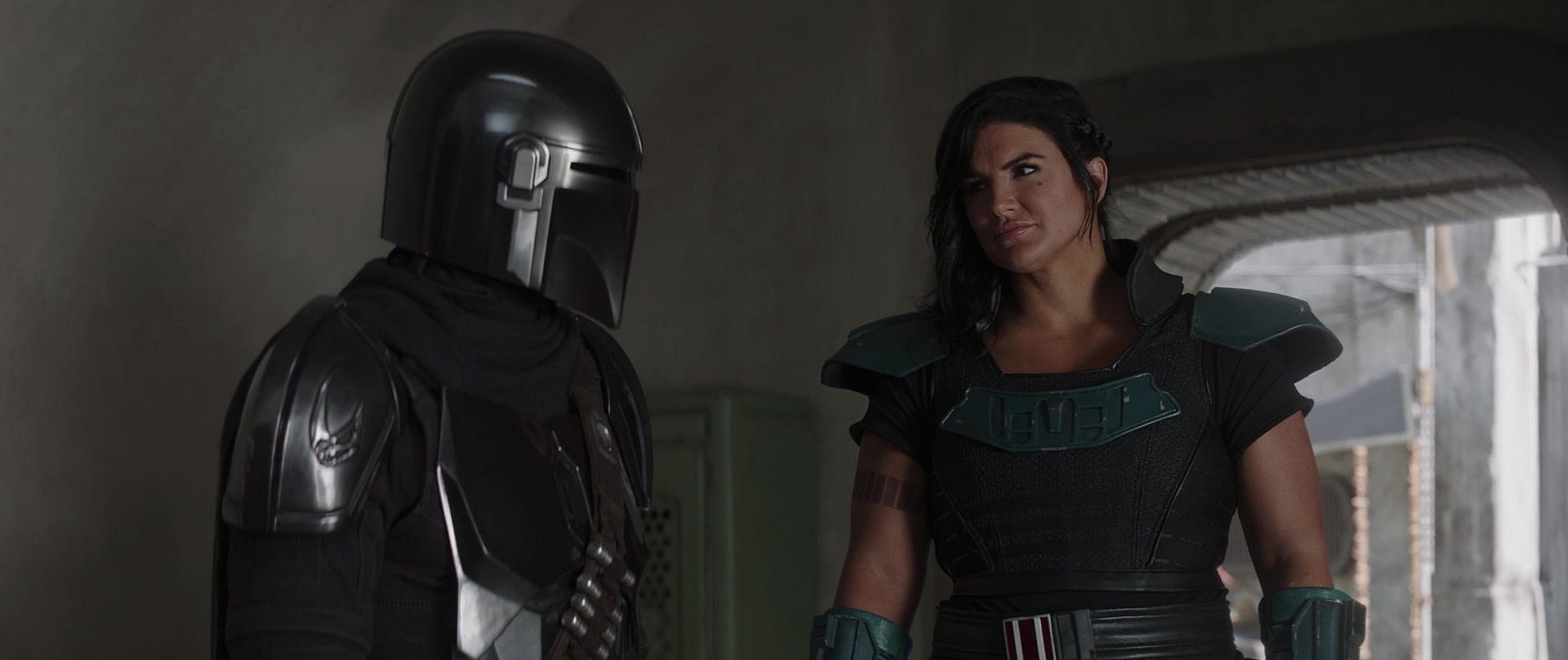 Cara Dune (Gina Carano) shows Din Djarin (Pedro Pascal) how far Navarro has come in The Mandalorian Season 2 Episode 4 "Chapter 12 - The Siege" (2020), Disney