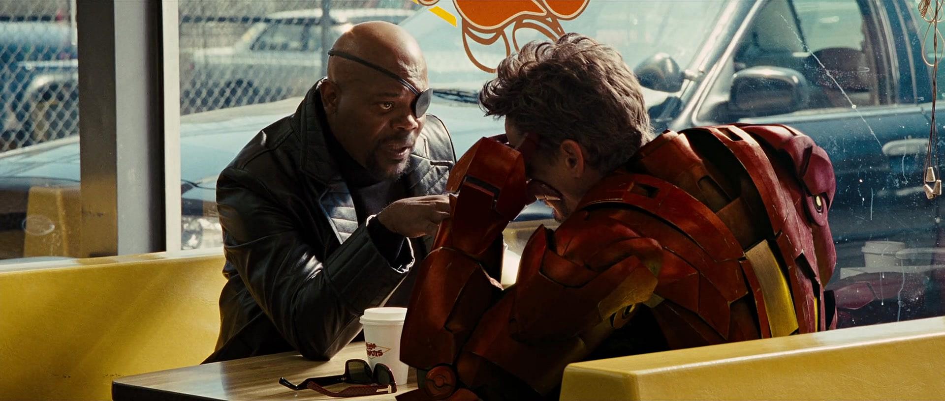 Nick Fury (Samuel L. Jackson) warns Tony Stark (Robert Downey Jr.) about his future in Iron Man 2
