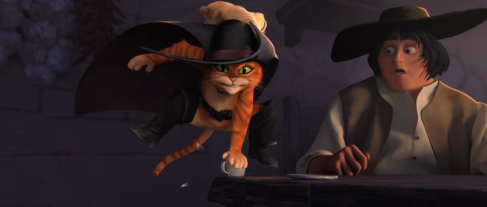 Puss In Boots (Antonio Banderas) gets a caffeine boost ahead of battle in Puss In Boots: The Last Wish (2022), Dreamworks via YouTube