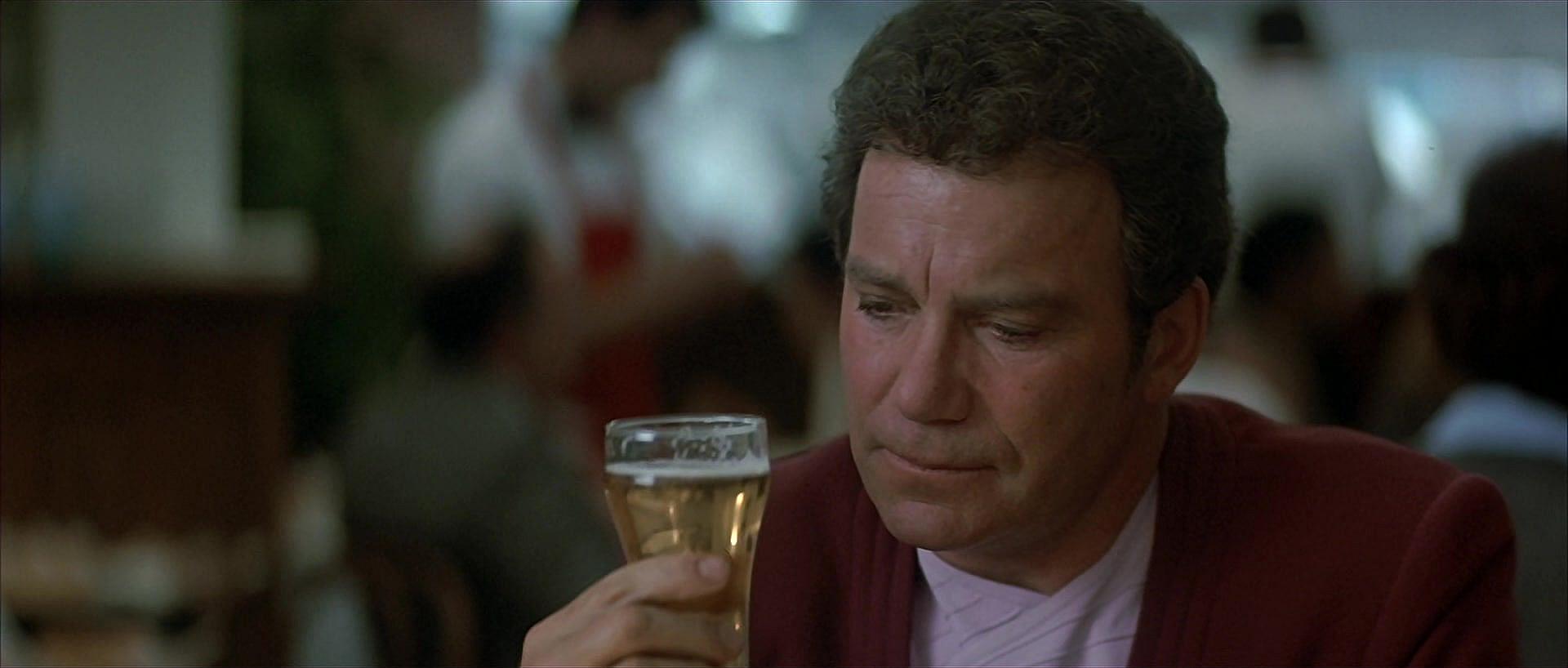 Captain Kirk (William Shatner) taken aback by 20th century beer taste in Star Trek IV: The Voyage
