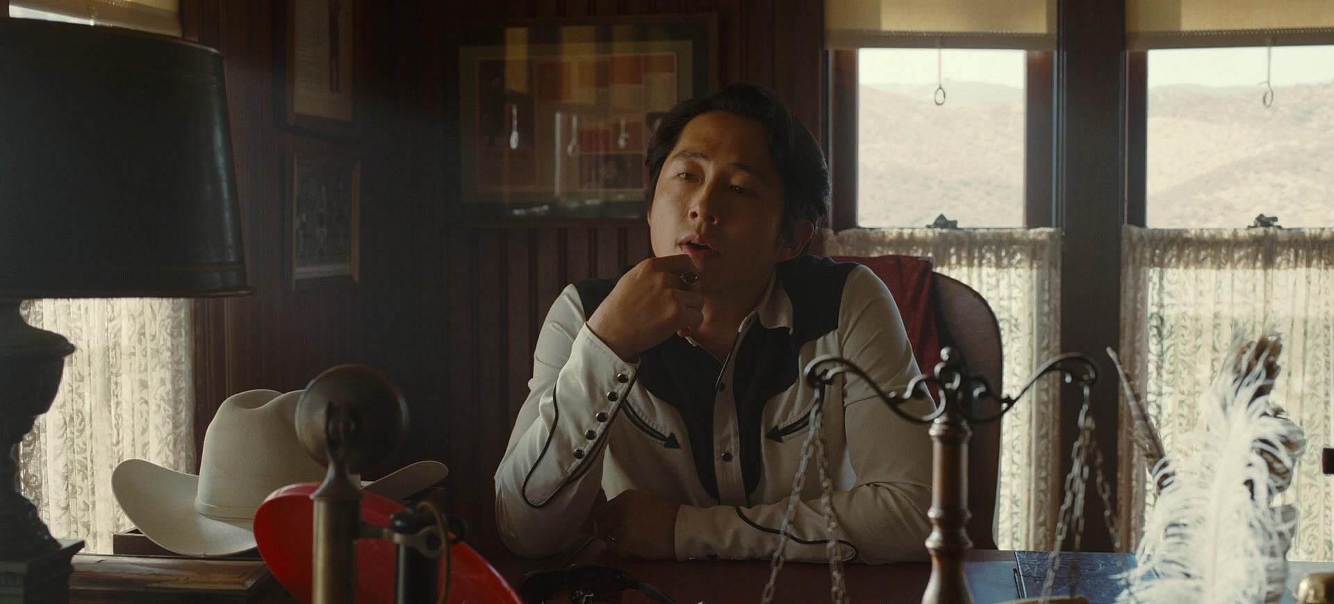 Ricky "Jupe" Park (Steven Yeun) meets with Otis "OJ" Haywood Jr. (Daniel Kaluuya) in Nope (2022), Universal Pictures