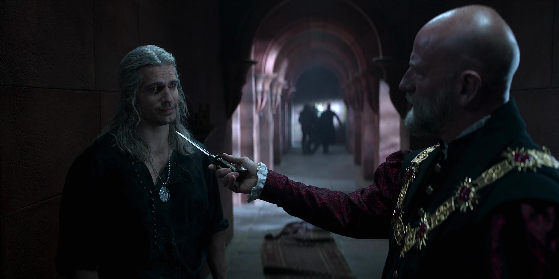 Dijkstra (Graham McTavish) holds knife to Geralt's throat (Henry Cavill) in The Witcher S3 E6
