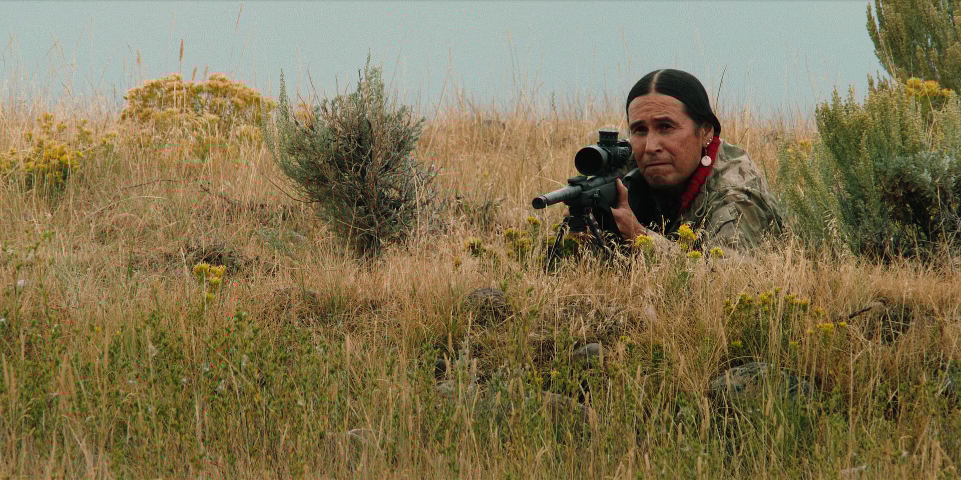 Mo Brings Plenty (Mo Brings Plenty) saves Monica Dutton (Kelsey Asbille) from a sexual assault by Peter (Austin Hébert) via Yellowstone Season 2 Episode 8 "I Killed A Man Today" (2020), Paramount Network