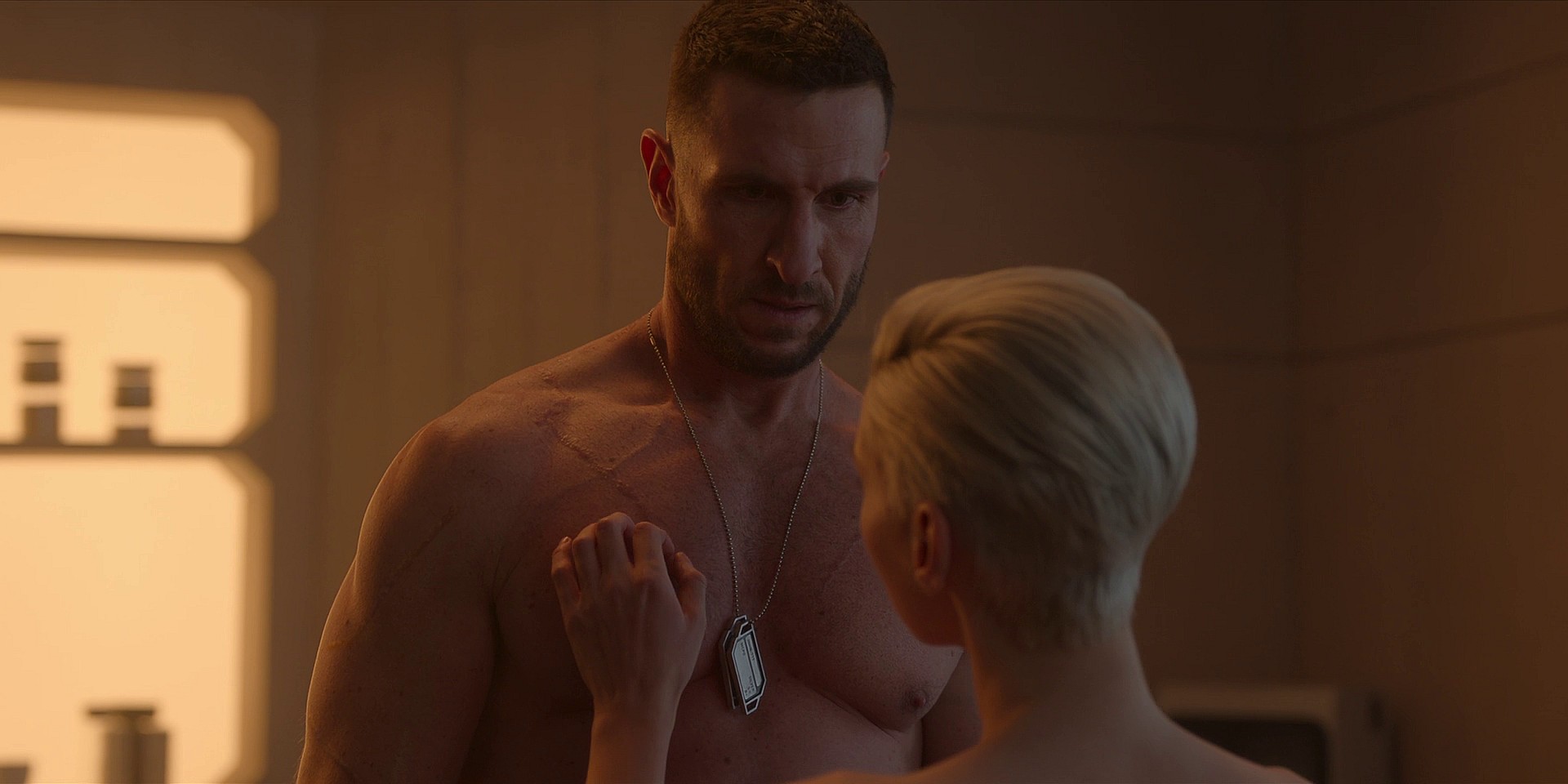 Master Chief (Pablo Schreiber) disrobes in front of Makee (Charlie Murphy) in Halo Season 1 Episode 8 “Allegiance” (2022), Paramount Plus