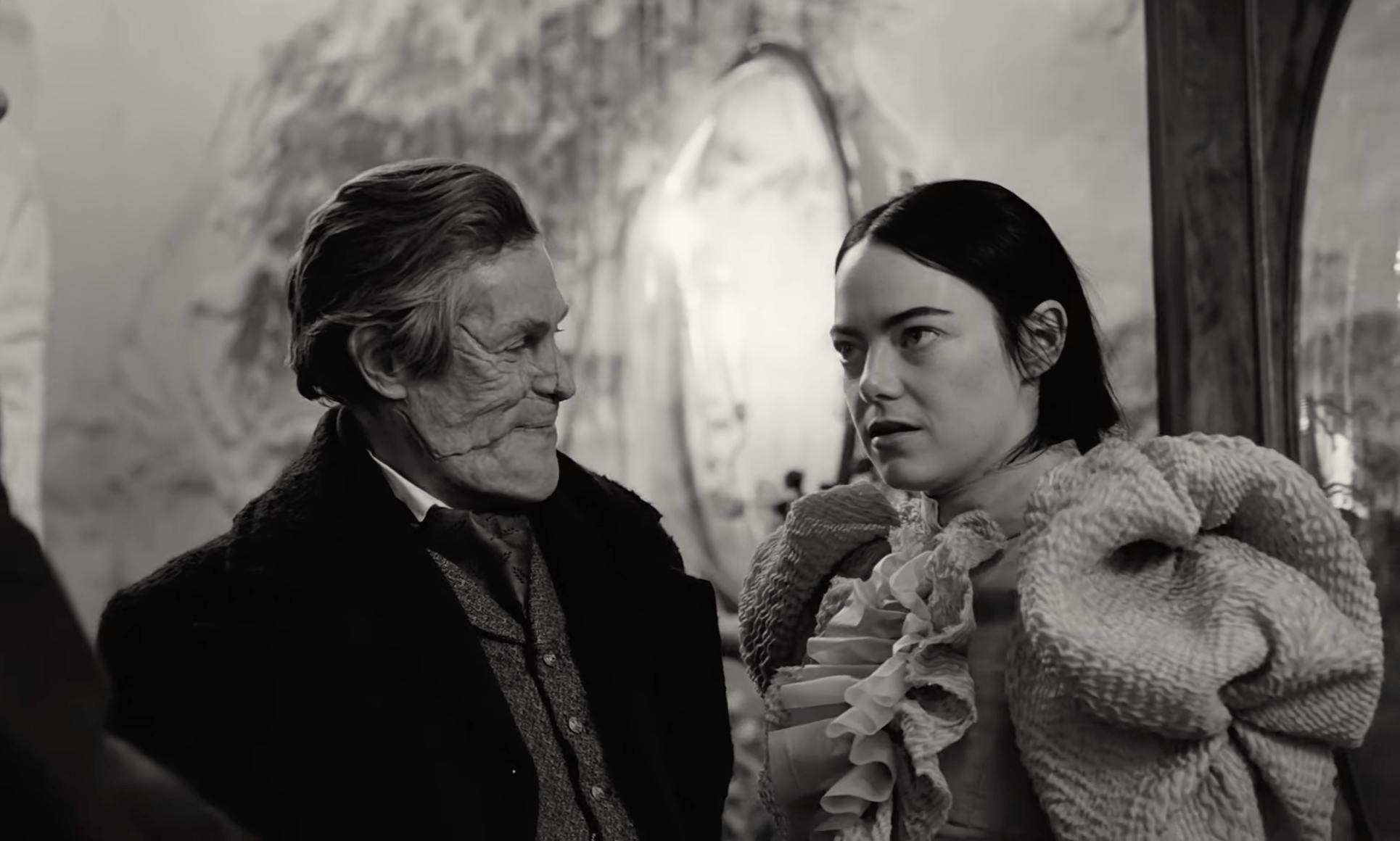 Willem Dafoe as Dr. William Baxter and Emma Stone as Bella Baxter in Poor Things (2023), Searchlight Pictures