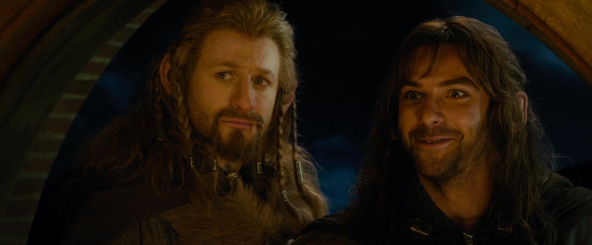 Fili (Dean O'Gorman) and Kili (Aidan Turner) introduce themselves to Bilbo (Martin Freeman) in The Hobbit: An Unexpected Journey (2012), Warner Bros. Pictures