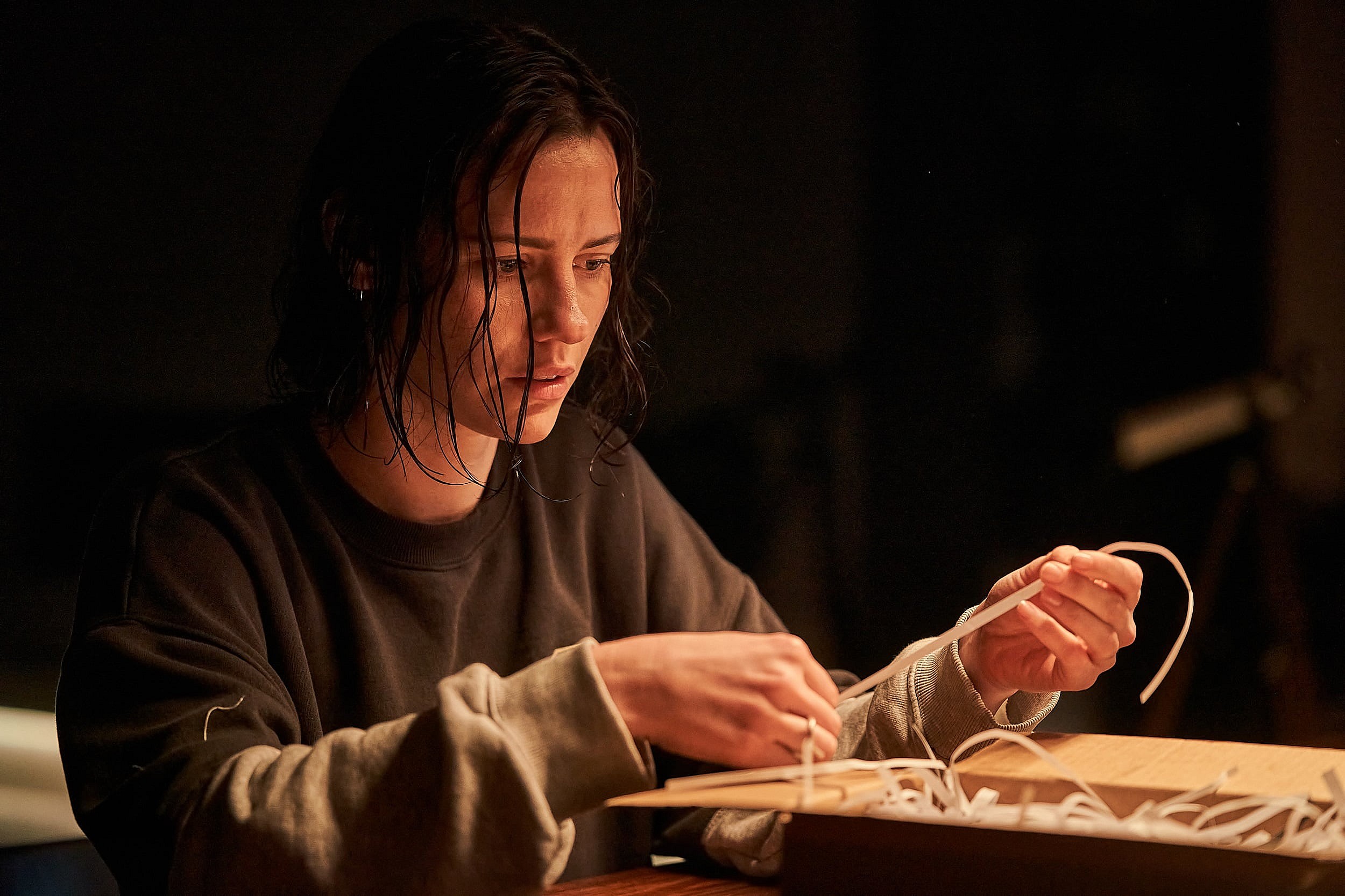 Lily Sullivan as The Interviewer in the Sci-Fi/Thriller film, MONOLITH, a Well Go USA release. Photo courtesy of Well Go USA. 