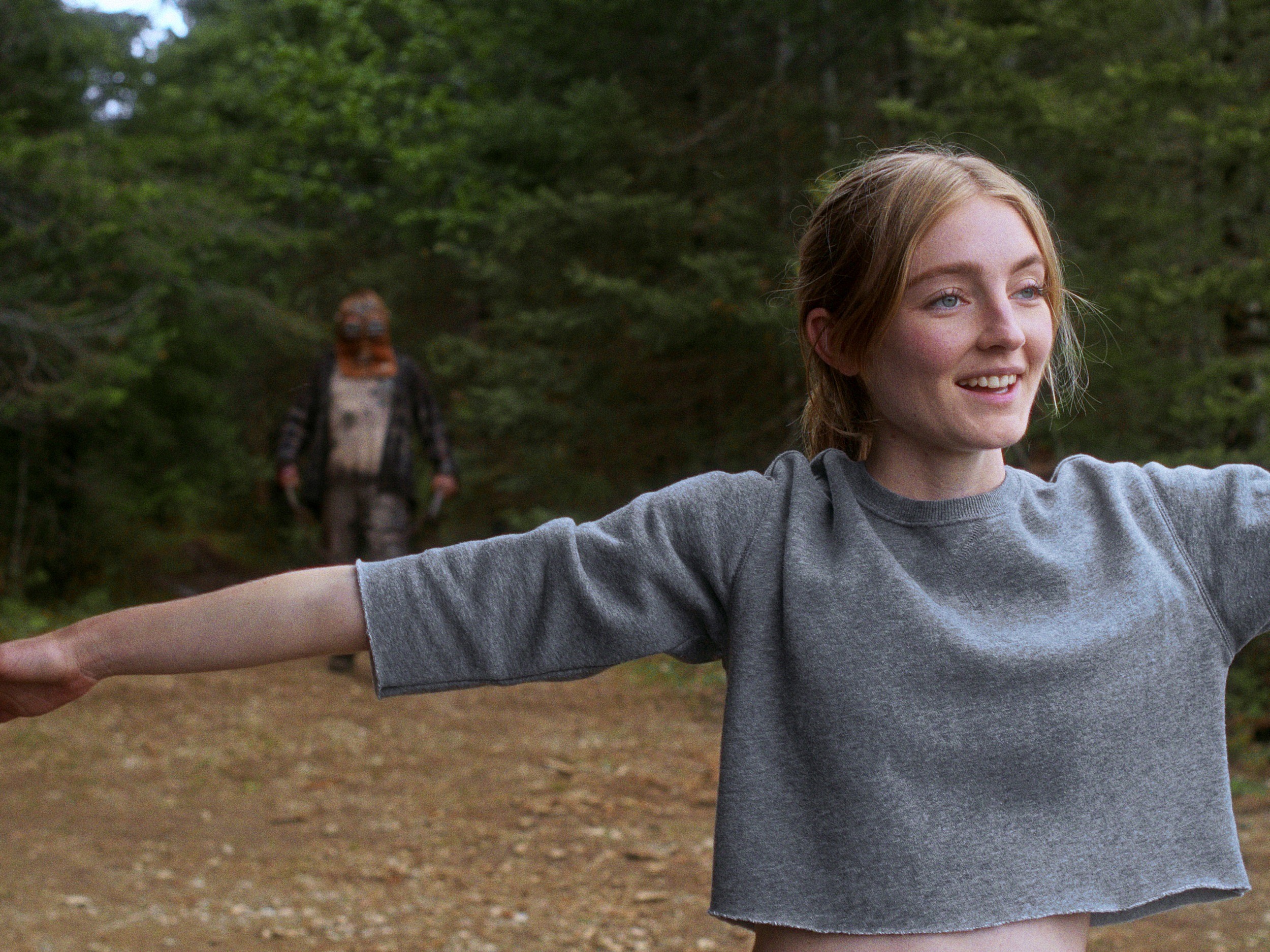 Ry Barrett and Charlotte Creaghan in Chris Nash’s IN A VIOLENT NATURE. Courtesy of Pierce Derks. An IFC Films & Shudder Release.