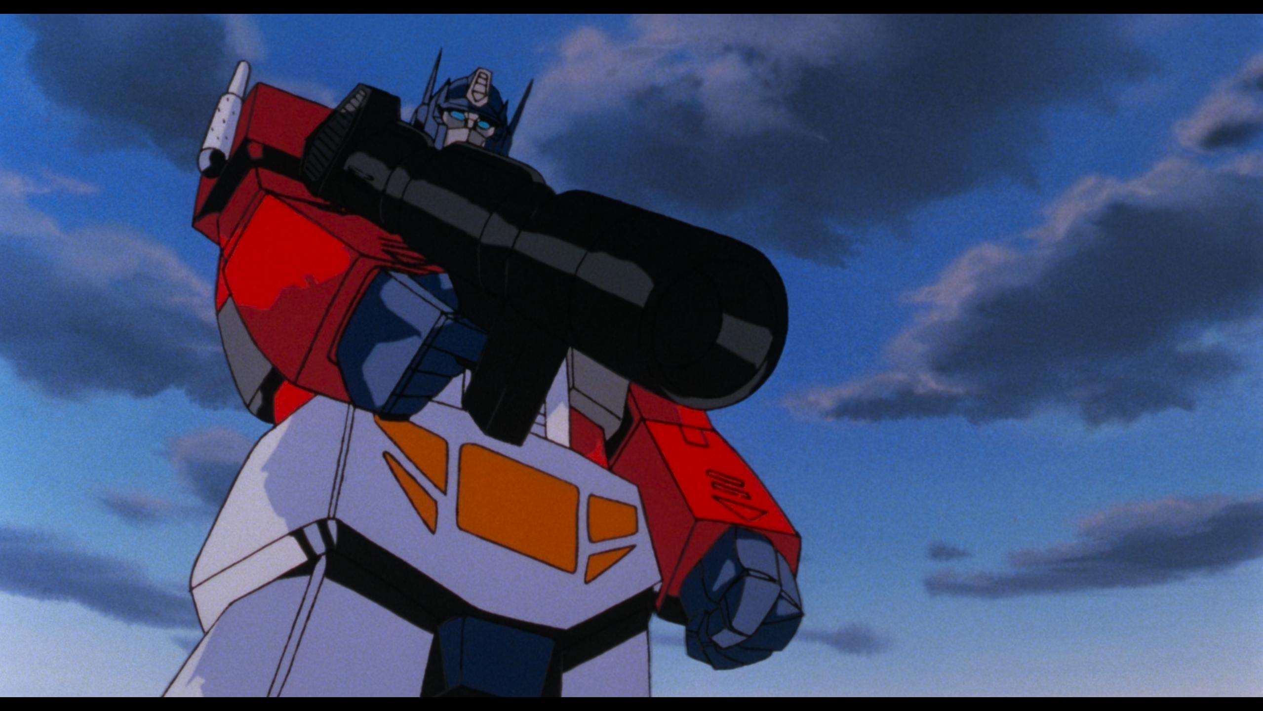 Optimus Prime (Peter Cullen) is ready to put an end to Megatron (Frank Welker) in The Transformers: The Movie (1986), Sunbow Productions