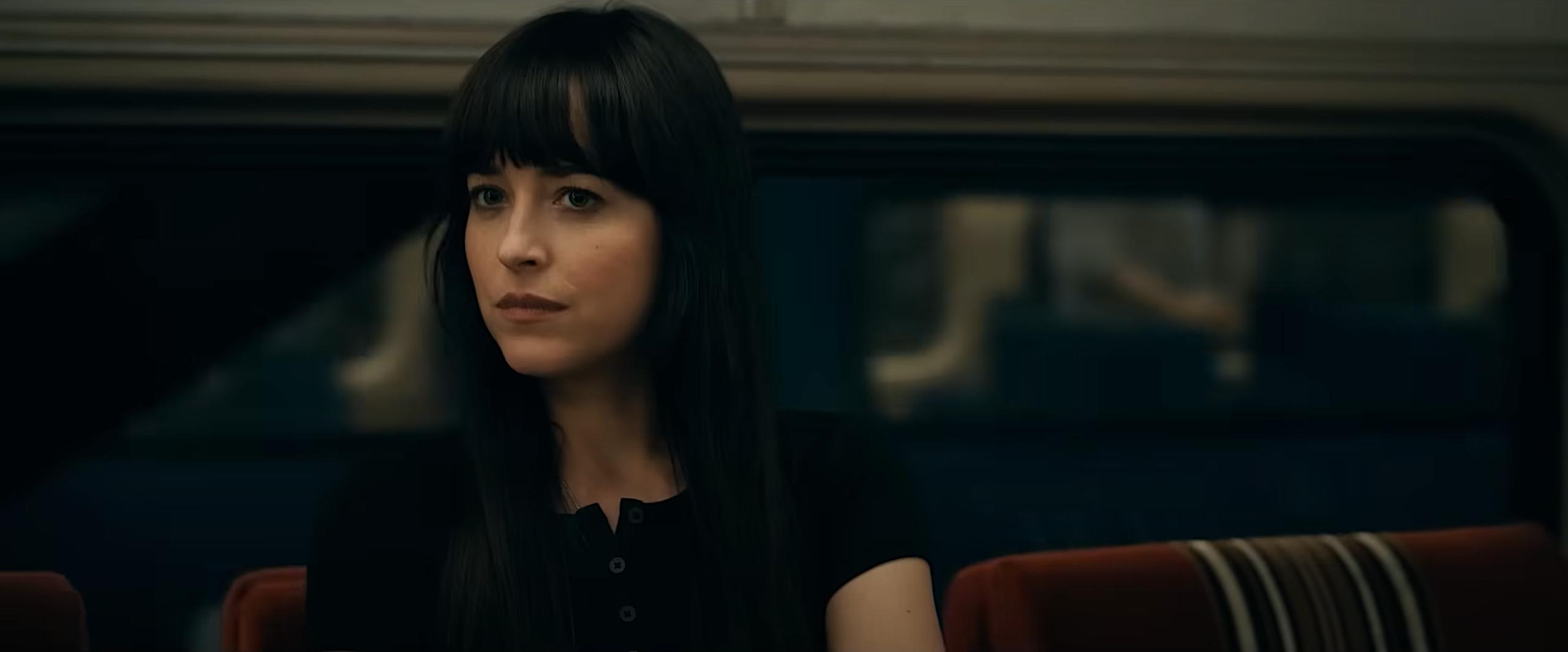 Cassie (Dakota Johnson) patiently waits for her vision to take place in Madame Web (2024), Sony Pictures Entertainment