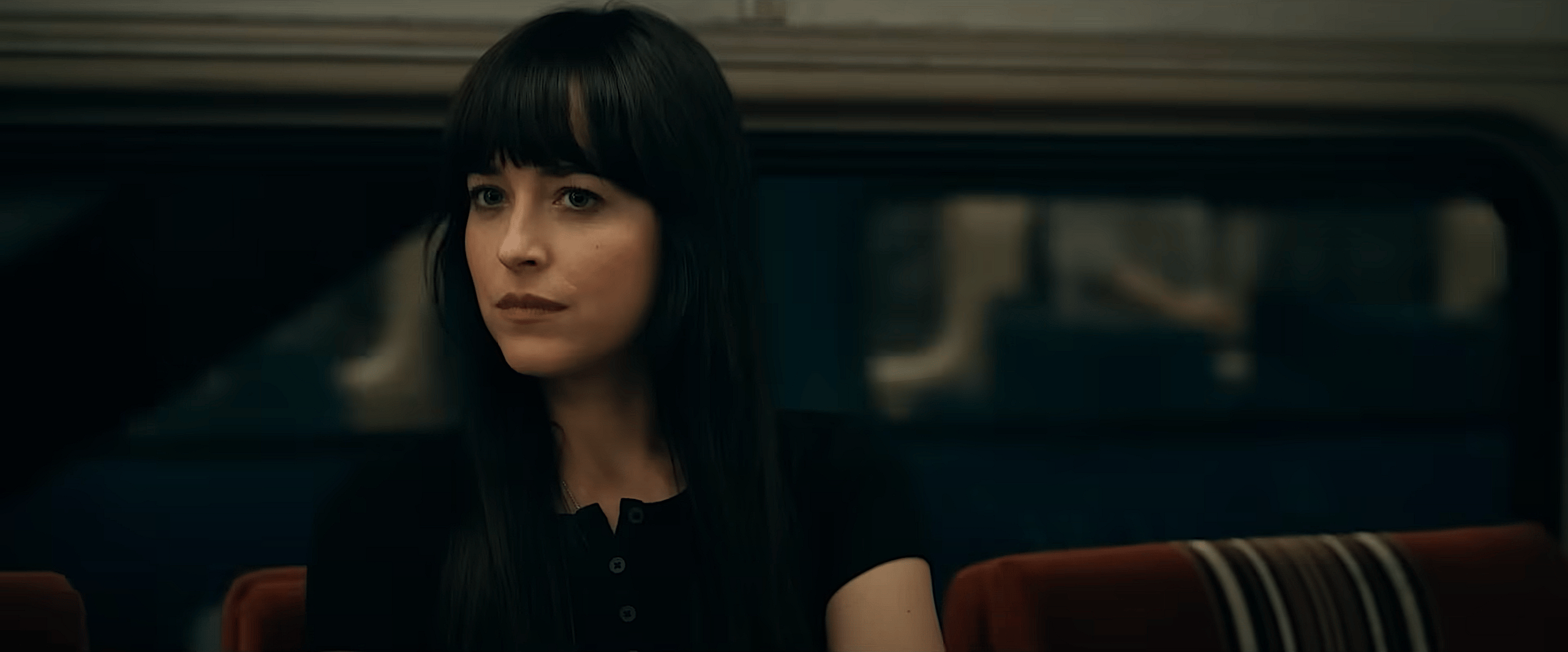 Cassie (Dakota Johnson) patiently waits for her vision to take place in Madame Web (2024), Sony Pictures Entertainment