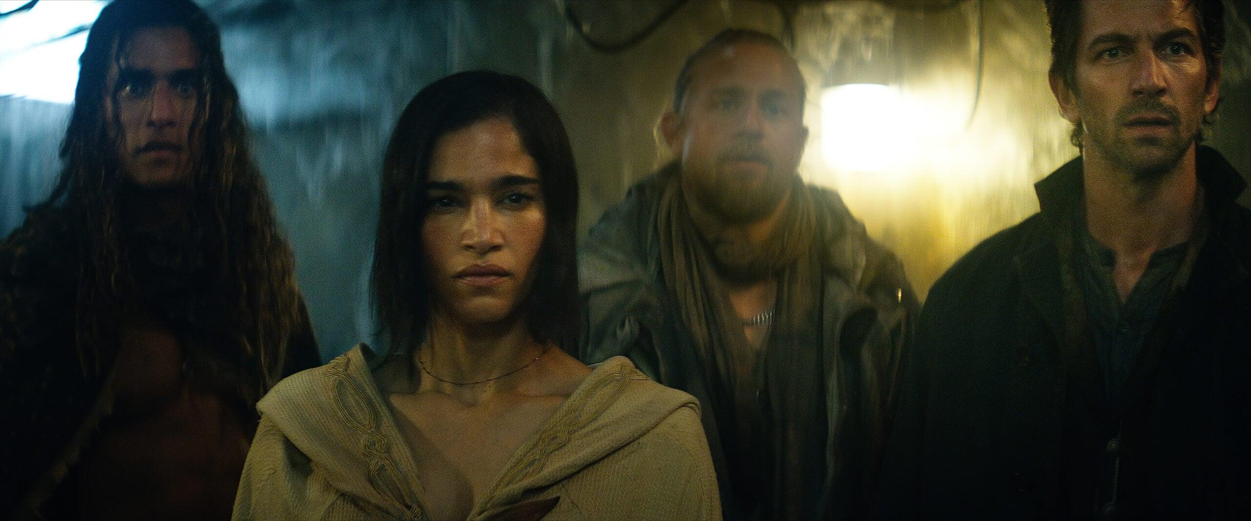 Rebel Moon. (L-R) Staz Nair as Tarak, Sofia Boutella as Kora, Charlie Hunnam as Kai and Michiel Huisman as Gunnar in Rebel Moon. Cr. NETFLIX ©2023