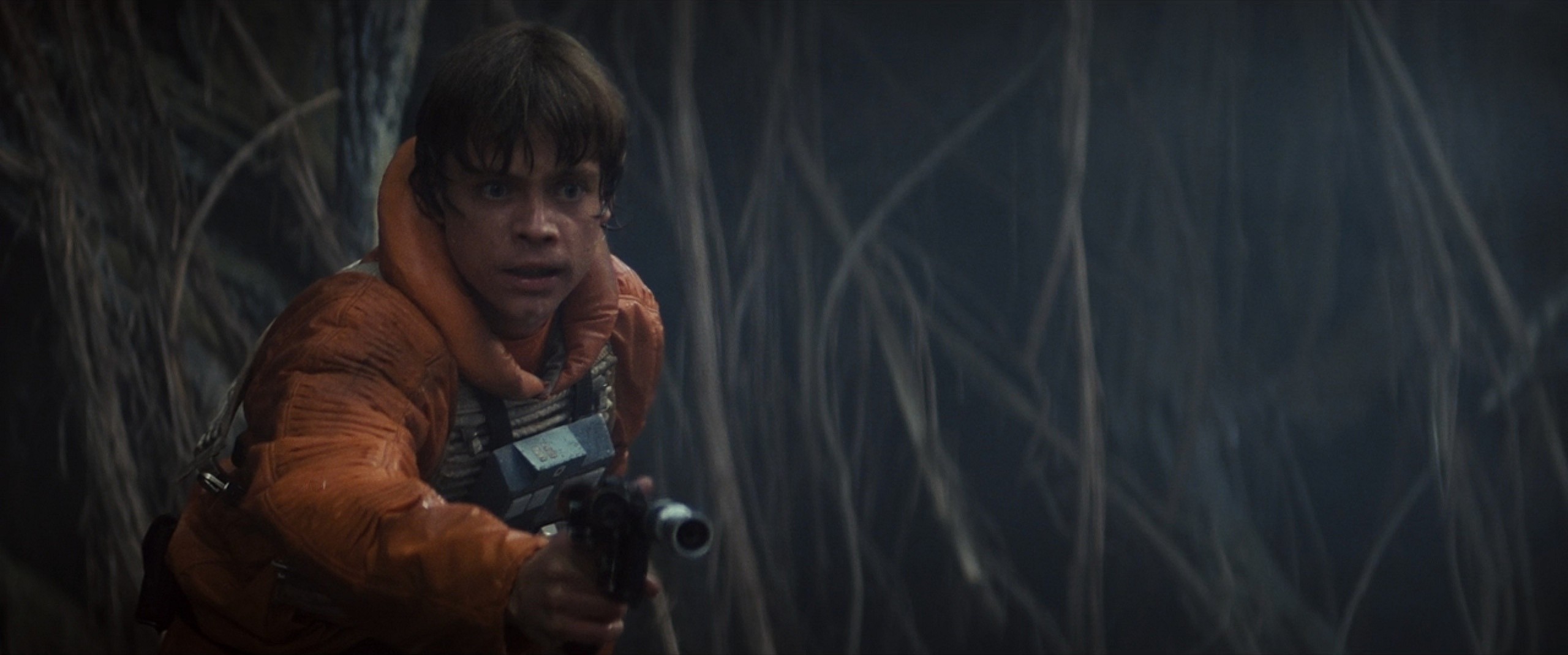 Luke Skywalker (Mark Hamill) comes to R2-D2's defence in Star Wars Episode V: The Empire Strikes Back (1980), Lucasfilm
