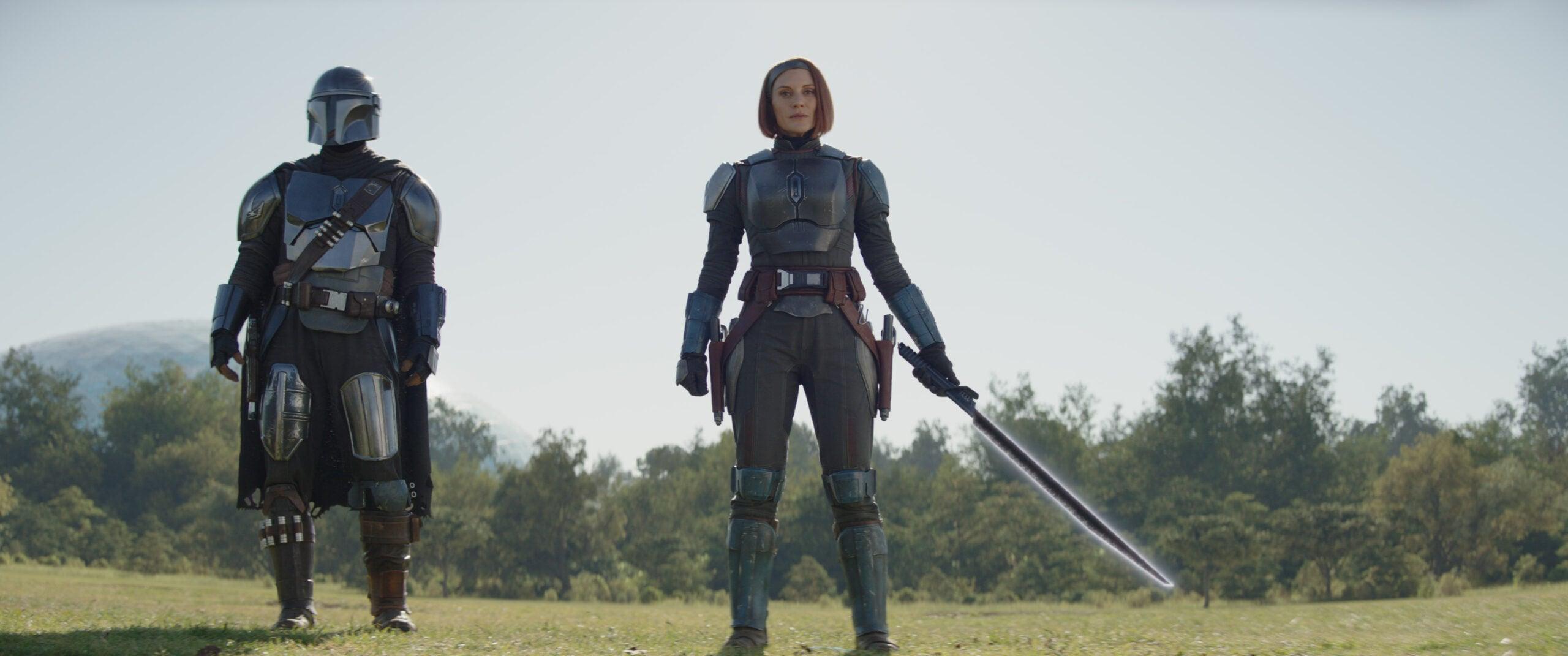 (L-R): Din Djarin (Pedro Pascal) and Bo-Katan Kryze (Katee Sackhoff) with the Darksaber in Lucasfilm's THE MANDALORIAN, season three, exclusively on Disney+. ©2023 Lucasfilm Ltd. & TM. All Rights Reserved.