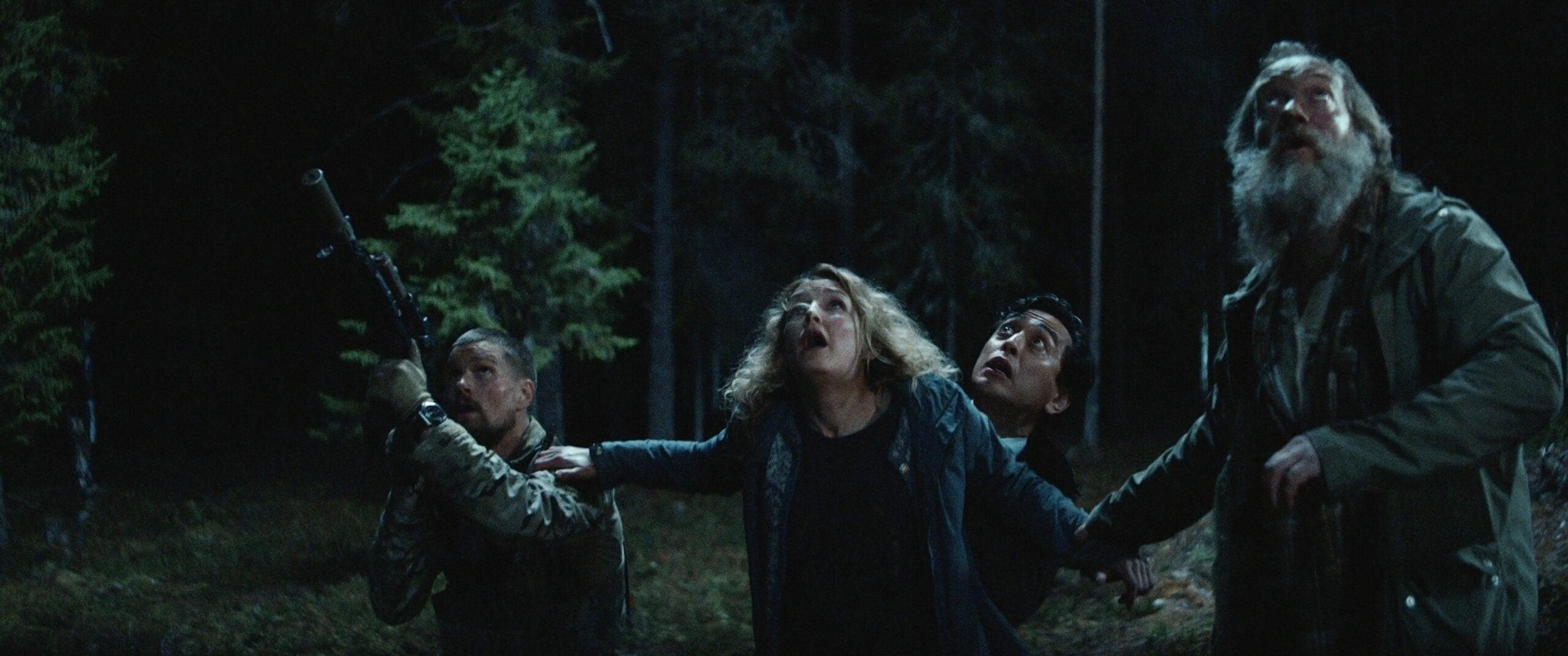 Troll. (L to R) Mads Sjøgård Pettersen as Captain Kris, Ine Marie Wilmann as Nora, Kim S. Falck-Jørgensen as Andreas Isaksen, Gard B. Eidsvold as Tobias. COURTESY OF NETFLIX © 2022