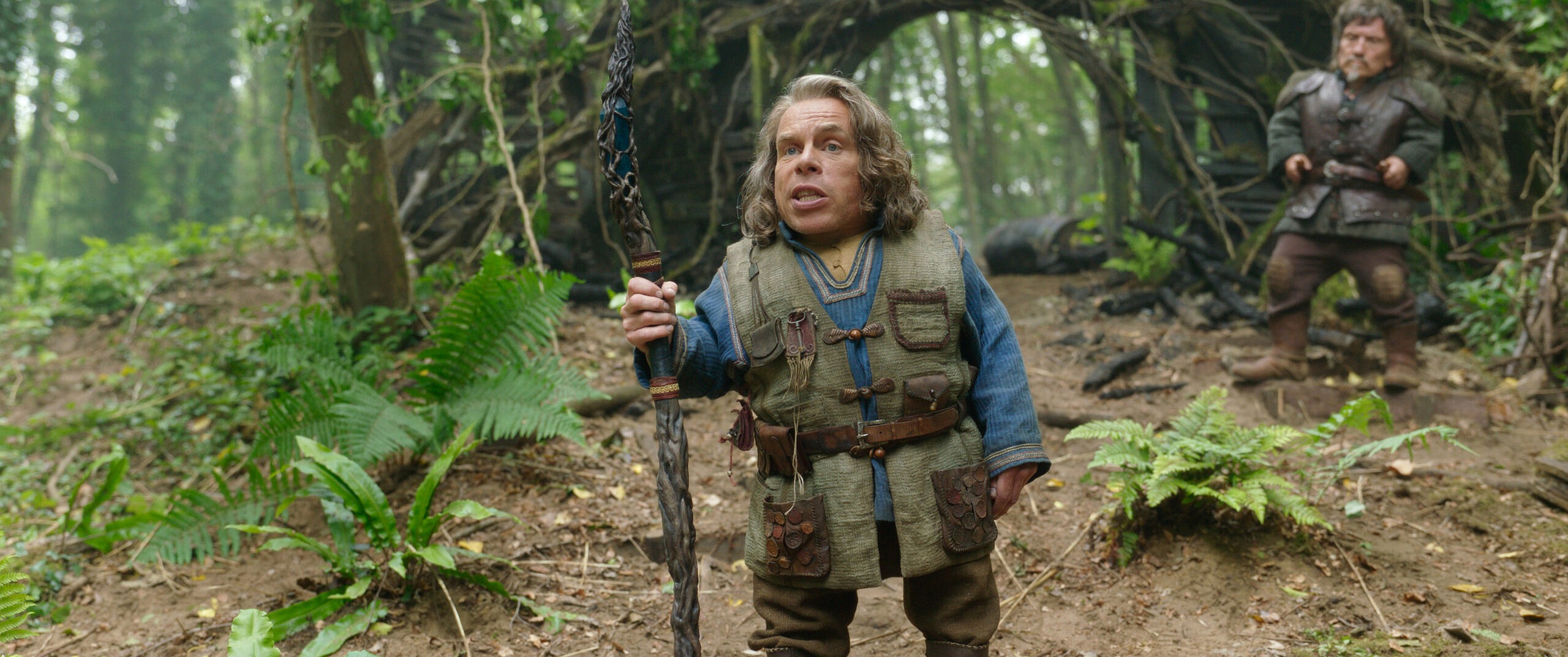 (L-R): Willow Ufgood (Warwick Davis) and (Graham Hughes) in Lucasfilm's WILLOW exclusively on Disney+. ©2022 Lucasfilm Ltd. & TM. All Rights Reserved.