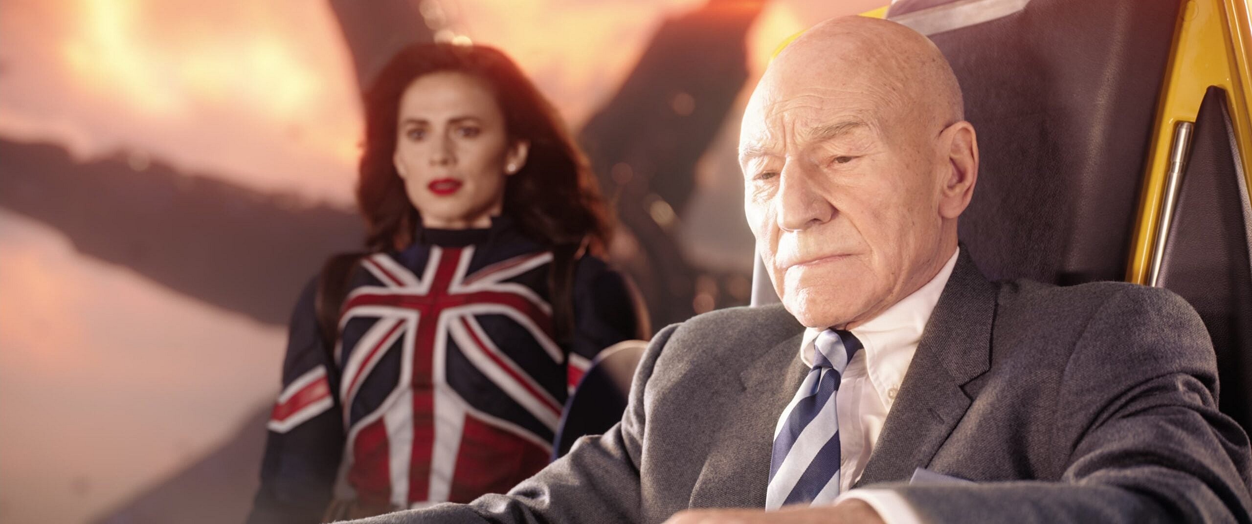 Charles Xavier (Patrick Stewart) and Captain Carter (Hayley Atwell) watch on as Black Bolt (Anson Mount) obliterates Doctor Strange (Benedict Cumberbatch) in Doctor Strange in the Multiverse of Madness (2022), Marvel Entertainment