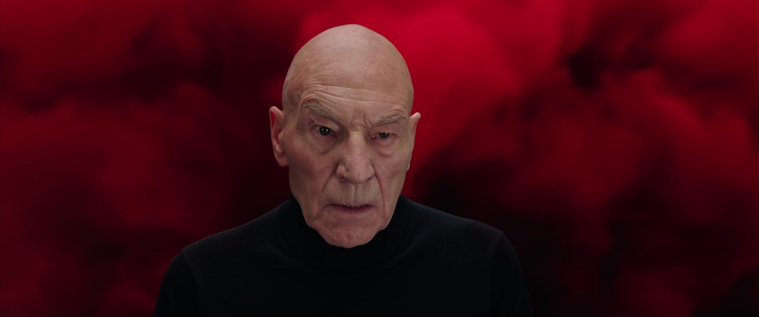 Charles Xavier (Patrick Stewart) enters the mind of Wanda Maximoff (Elizabethj Olsen) in Doctor Strange in the Multiverse of Madness (2022), Marvel Entertainment